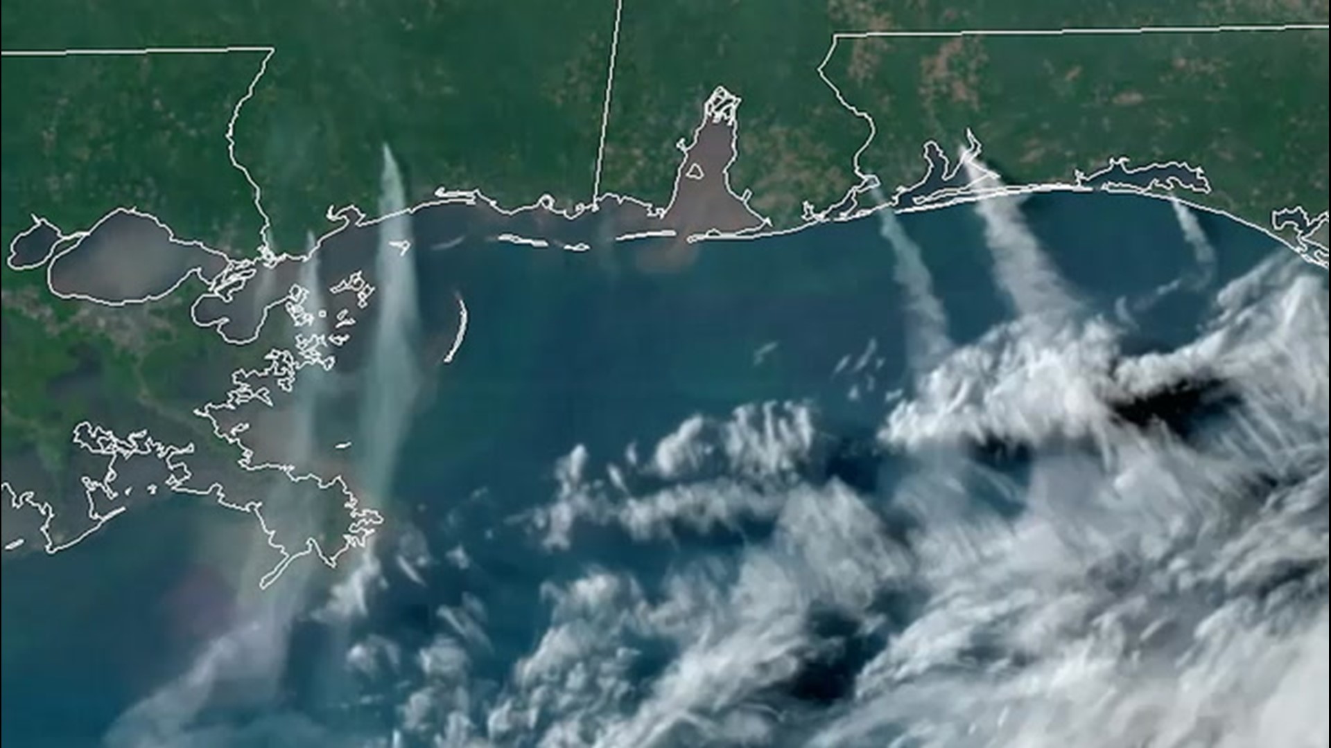 This satellite loop, from May 6, shows smoke from large fires in Florida, Alabama and Mississippi drifting south into the Gulf of Mexico.