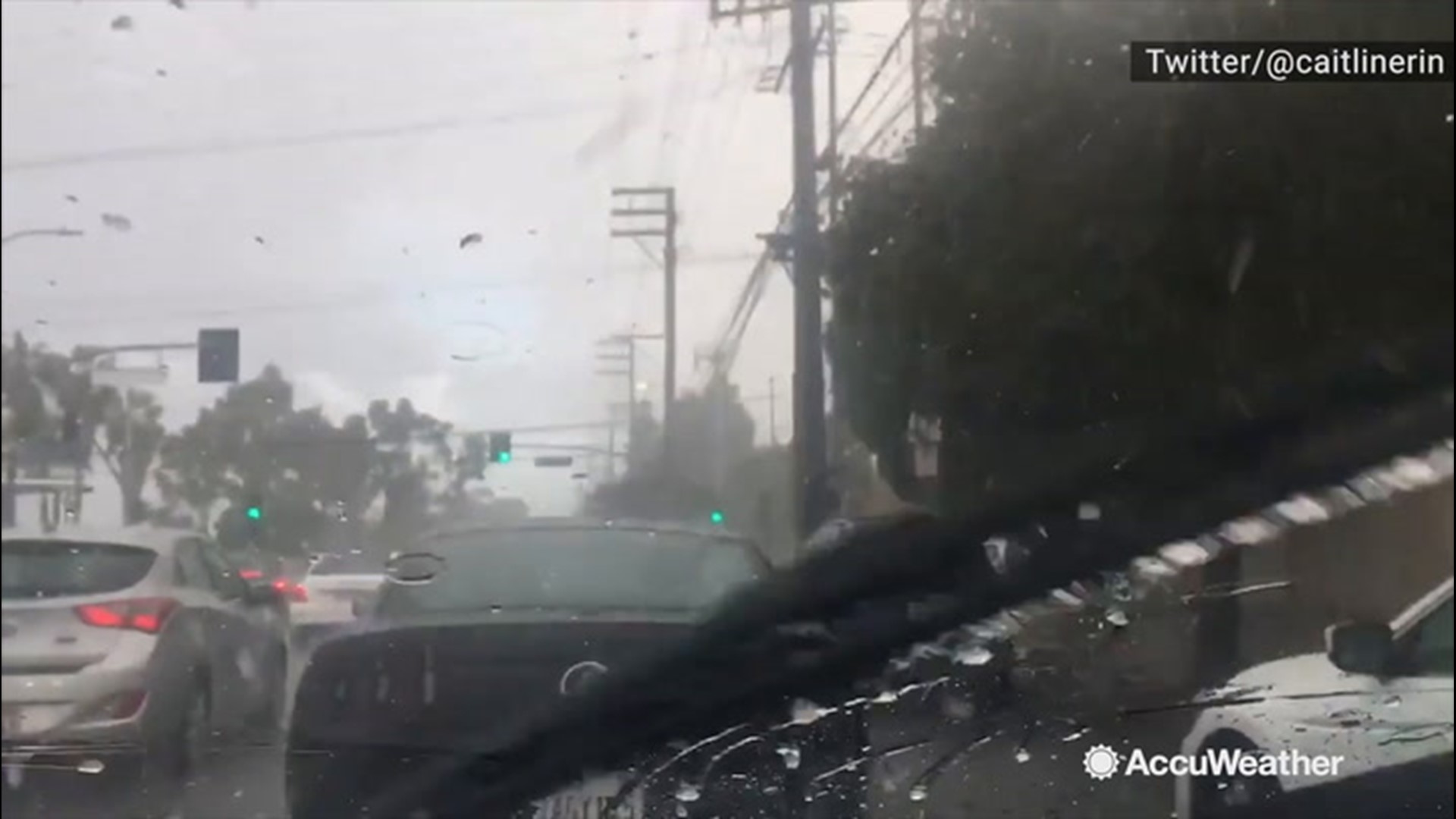 Thunderstorms brought rain and some hail into Southern California, which peppered these cars stuck at a traffic light in Los Angeles on Nov. 20.