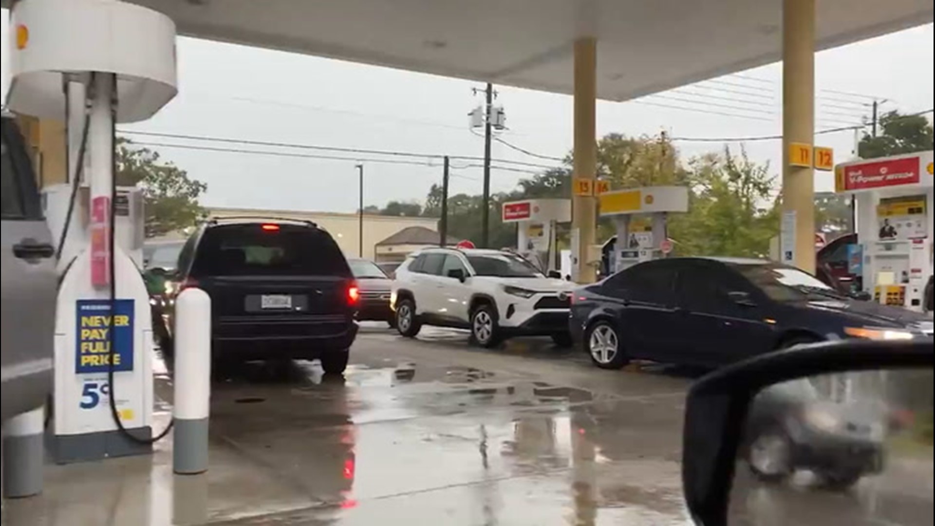 People living in South Florida prepare for Eta's approach to the region on Nov. 11. This gas station in the town of Seminole had a busy day with evacuees lining up to stock up on fuel.