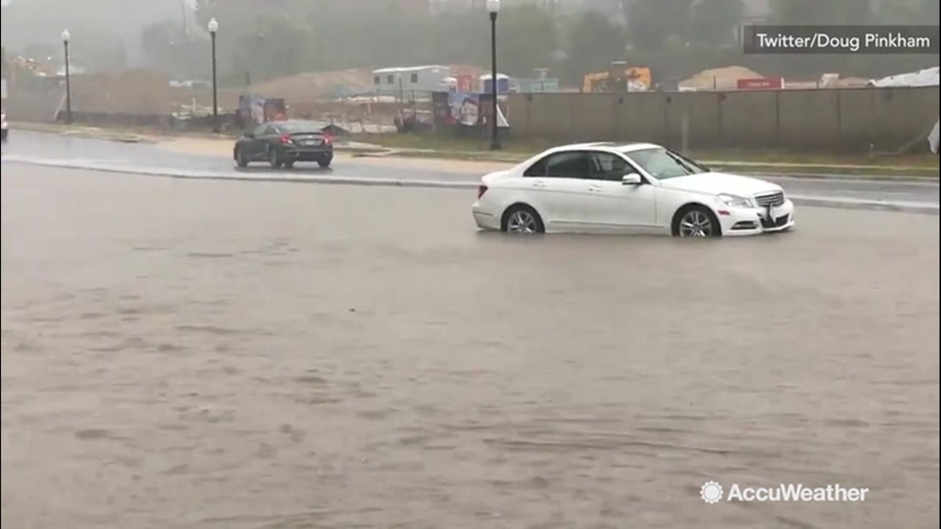 Severe rainfall left many of the streets in Fairfax, Virginia, completely inundated on Aug. 15. Multiple drivers can be seen risking their cars by crossing through the floodwaters.