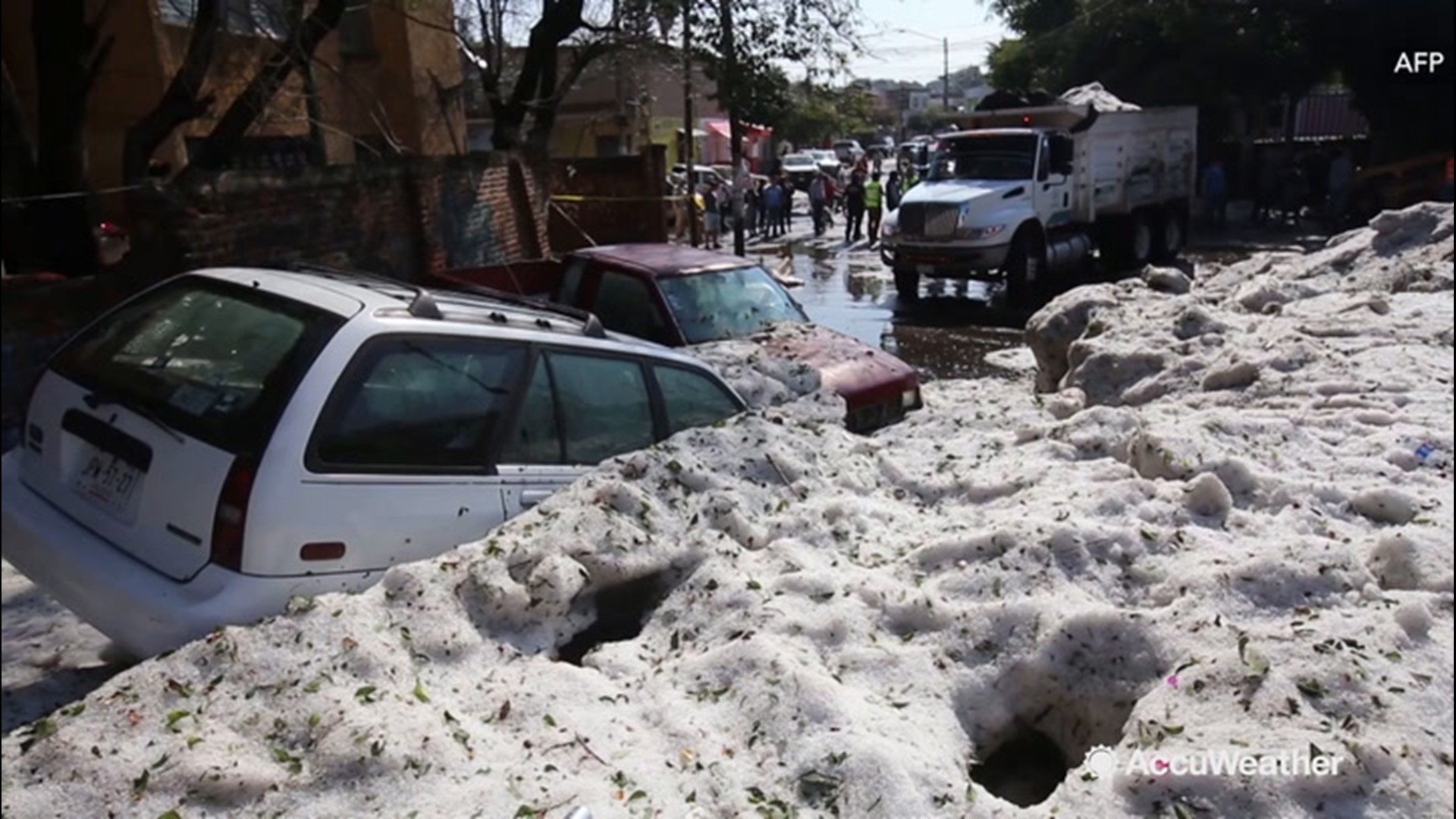 Cars were trapped  in Guadalajara, Mexico, on June 30, after a storm dropped extreme amounts of hail on the area.