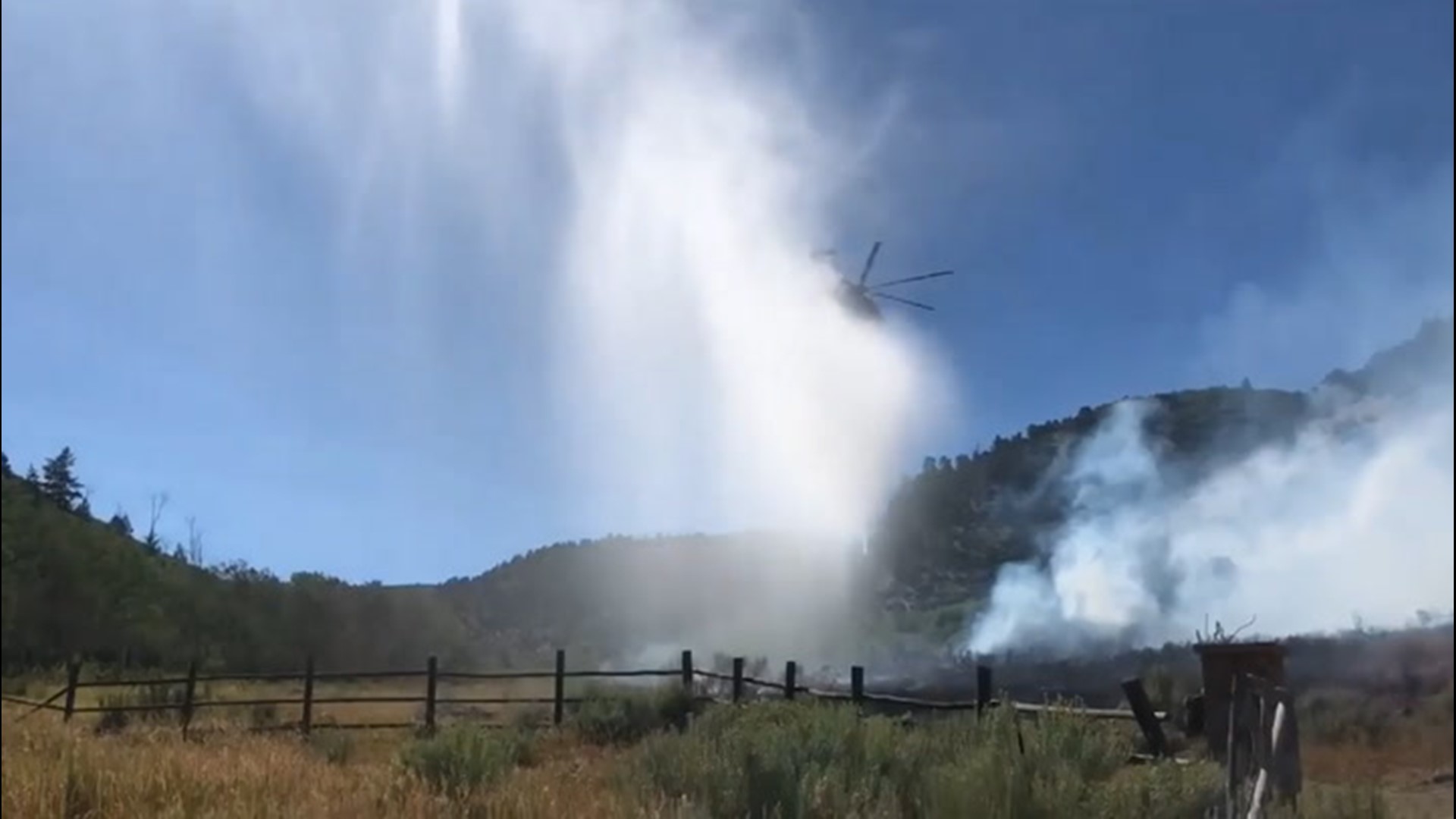 The Pine Gulch Fire in Mesa County, Colorado, burned over 20,000 acres on Aug. 8. This helicopter dropped water to help firefighters put out the fire on Aug. 7.