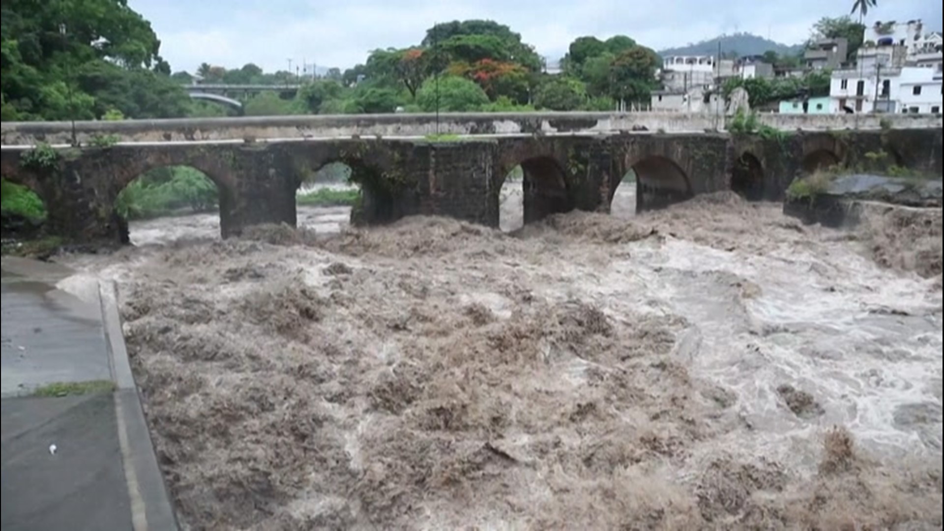 The Los Esclavos River raged through Cuilapa, Guatemala, on May 31, as Tropical Storm Amanda lashed the island.
