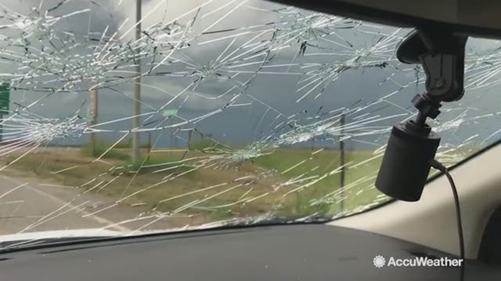 Hail smashes through Reed Timmer's windshield during storm chase | wgrz.com