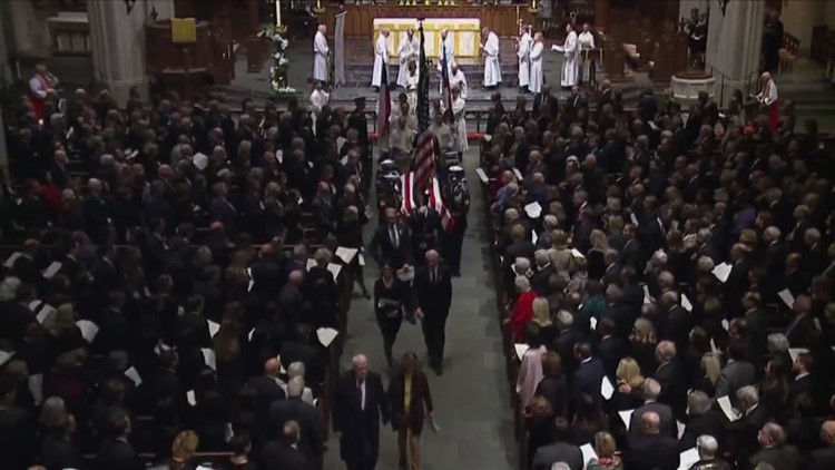 Bush's casket leaves St. Martin's Cathedral in Houston