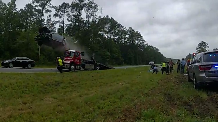 Driver sends car flying more than 100 feet after hitting parked tow truck ramp