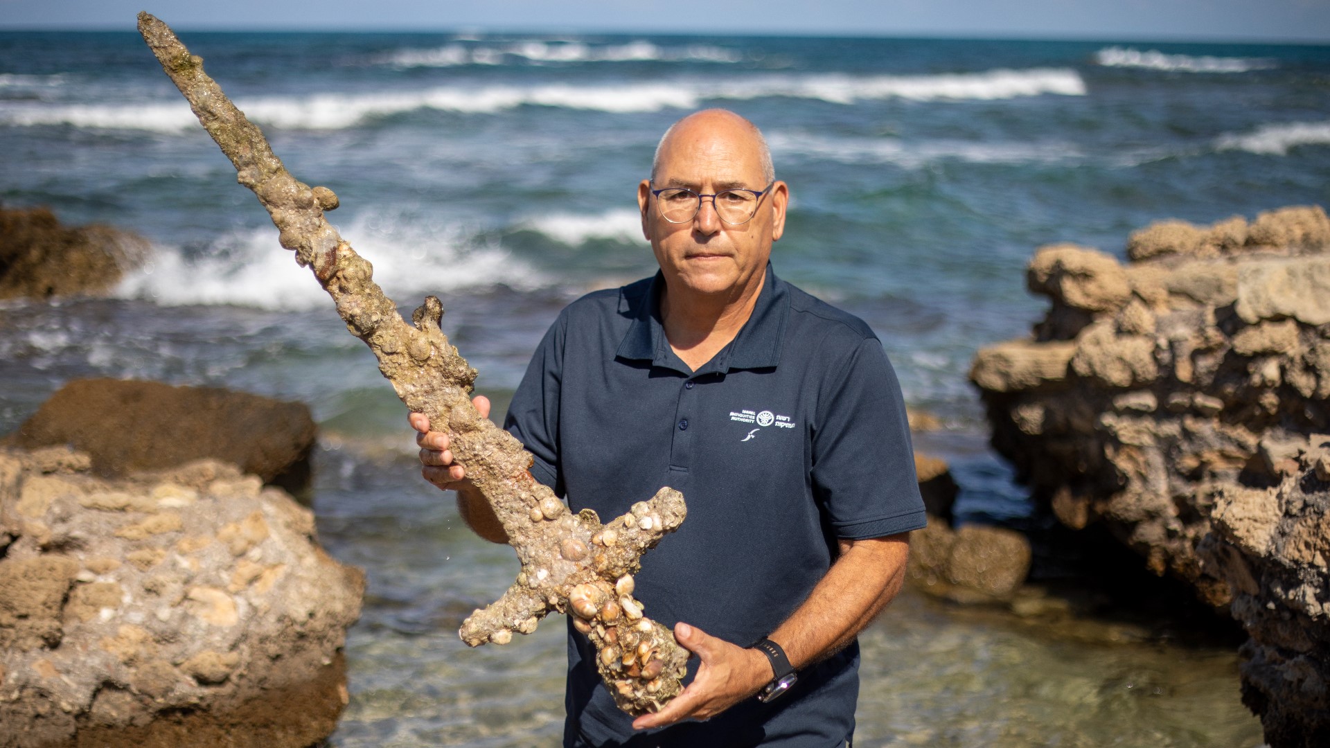 An Israeli scuba diver has salvaged an ancient sword off the country's Mediterranean coast that experts say dates back to the Crusades.