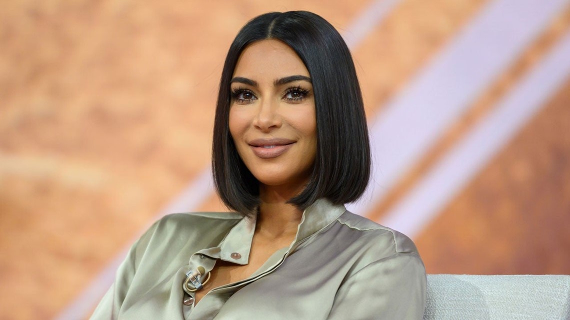 Image of Kim K blunt cut with family