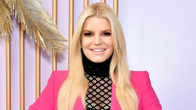Jessica Simpson slips into tight jeans from her 20s as she turns