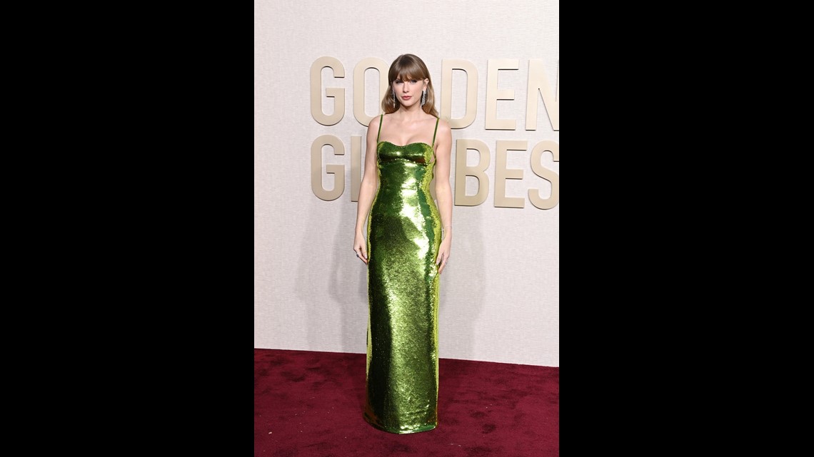Taylor Swift Braves the Rain in a Green Dress as She Visits NYC Recording Studio | wgrz.com Taylor Swift Braves the Rain in a Green Dress as She Visits NYC Recording Studio | wgrz.com