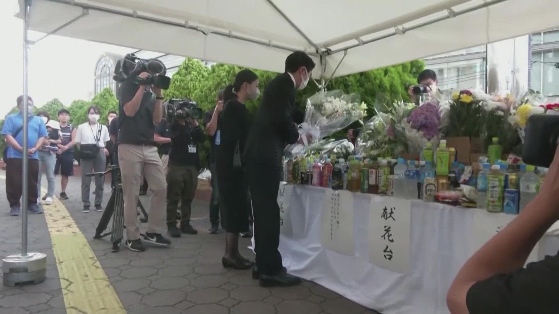 The body of Shinzo Abe arrived at his home on Saturday.