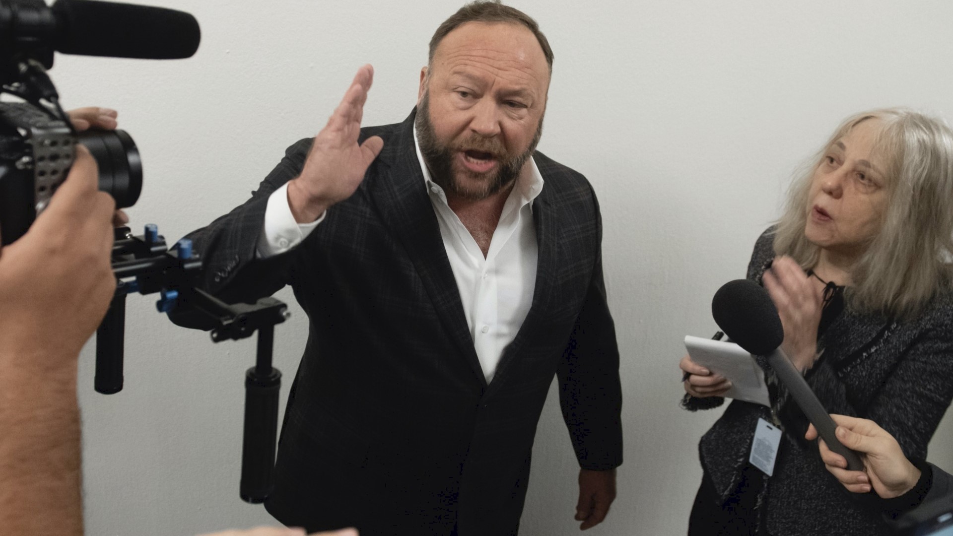 Sandy Hook shooting conspiracy theorist Alex Jones is seeking to dismiss a lawsuit brought against him by one of the victim's family members. Veuer's Justin Kircher has the story.