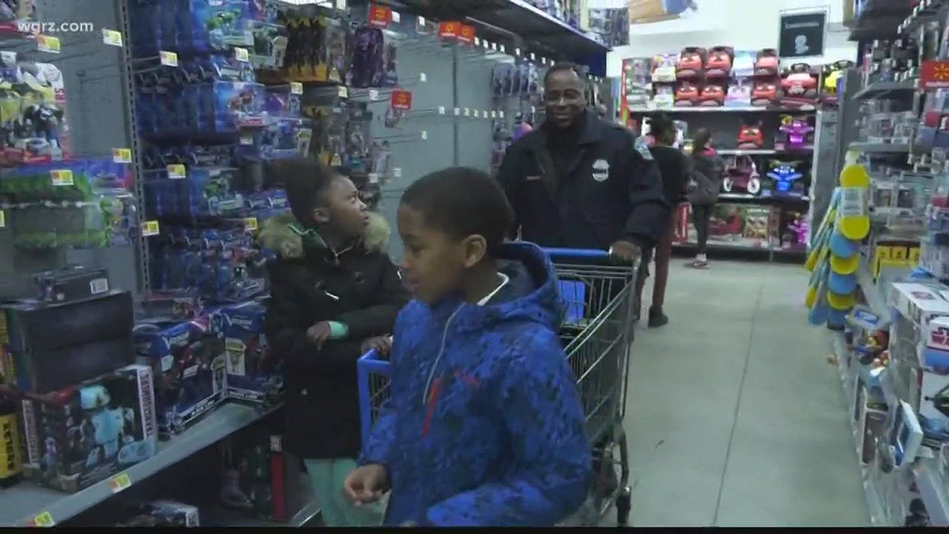 Buffalo police officers treat children to shopping spree
