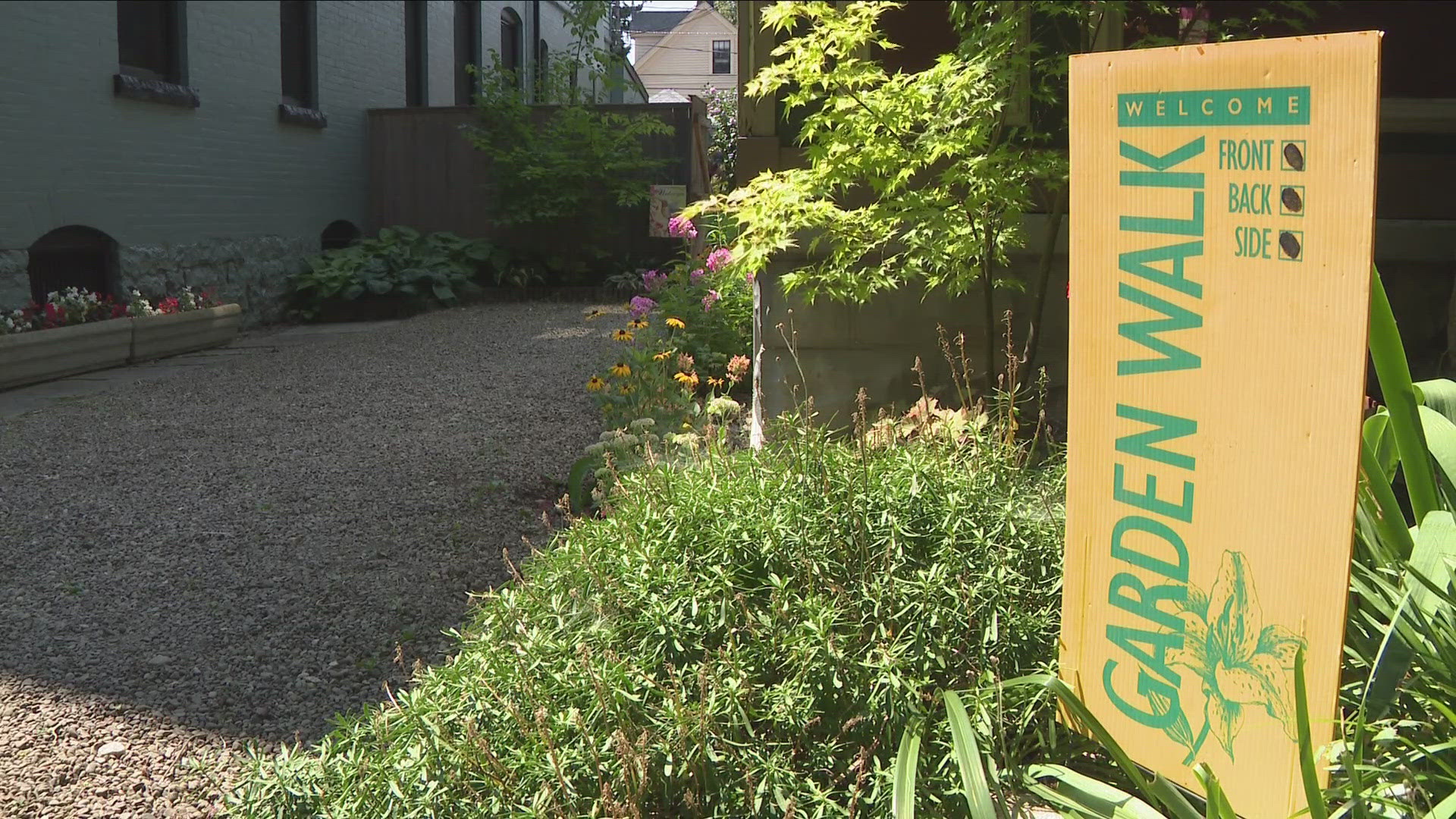 More than 300 gardeners participated in this year's self-guided tours of the colorful neighborhood displays.