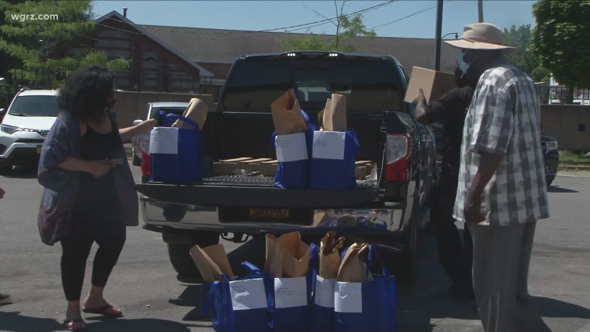Lawmakers and officers with Buffalo Police today were handing out food for people who need it at the C District police station on East Ferry.