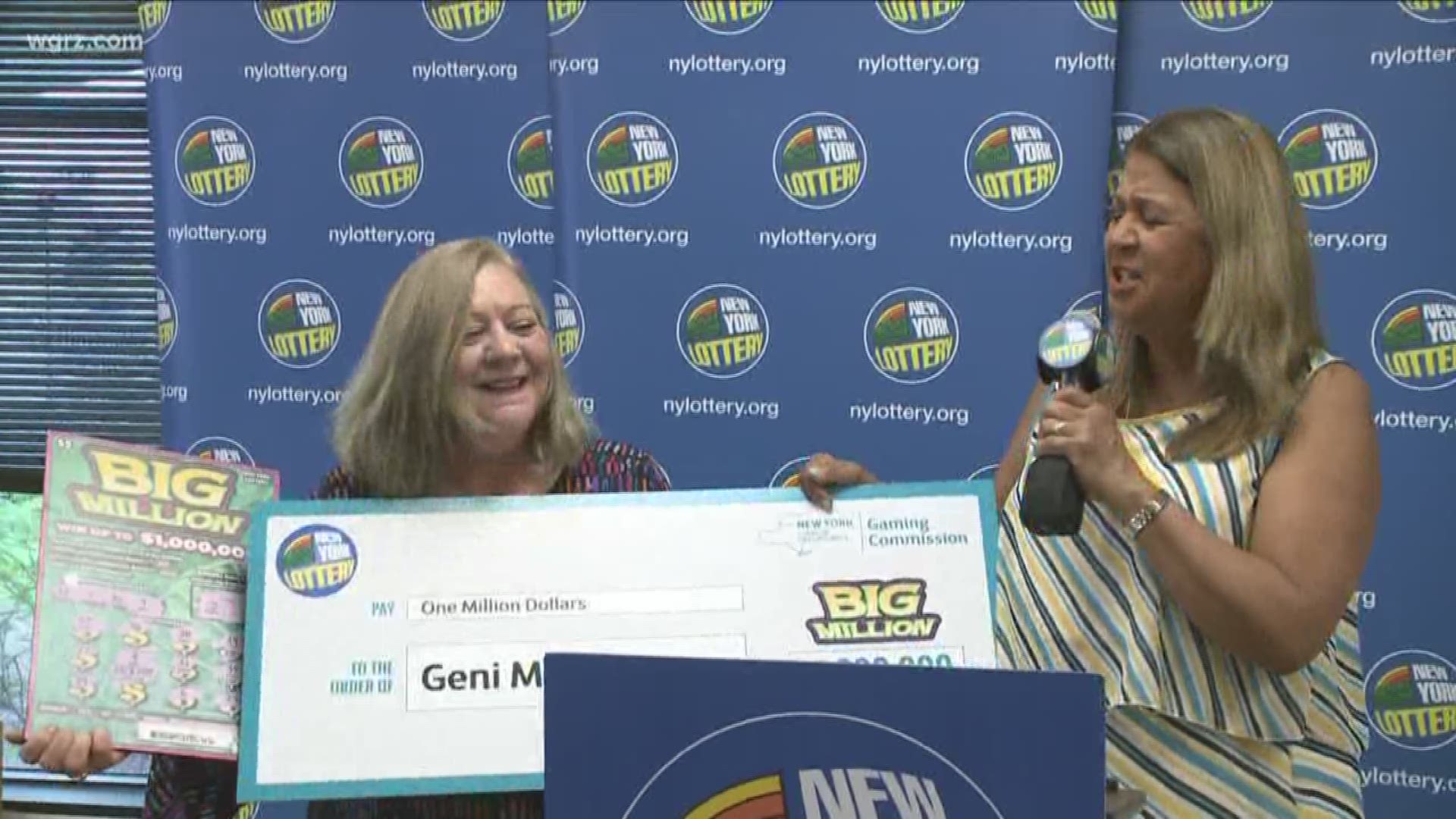 That'd be 62-year-old Geni (genie) Miller, who got the big check from Yolanda Vega today