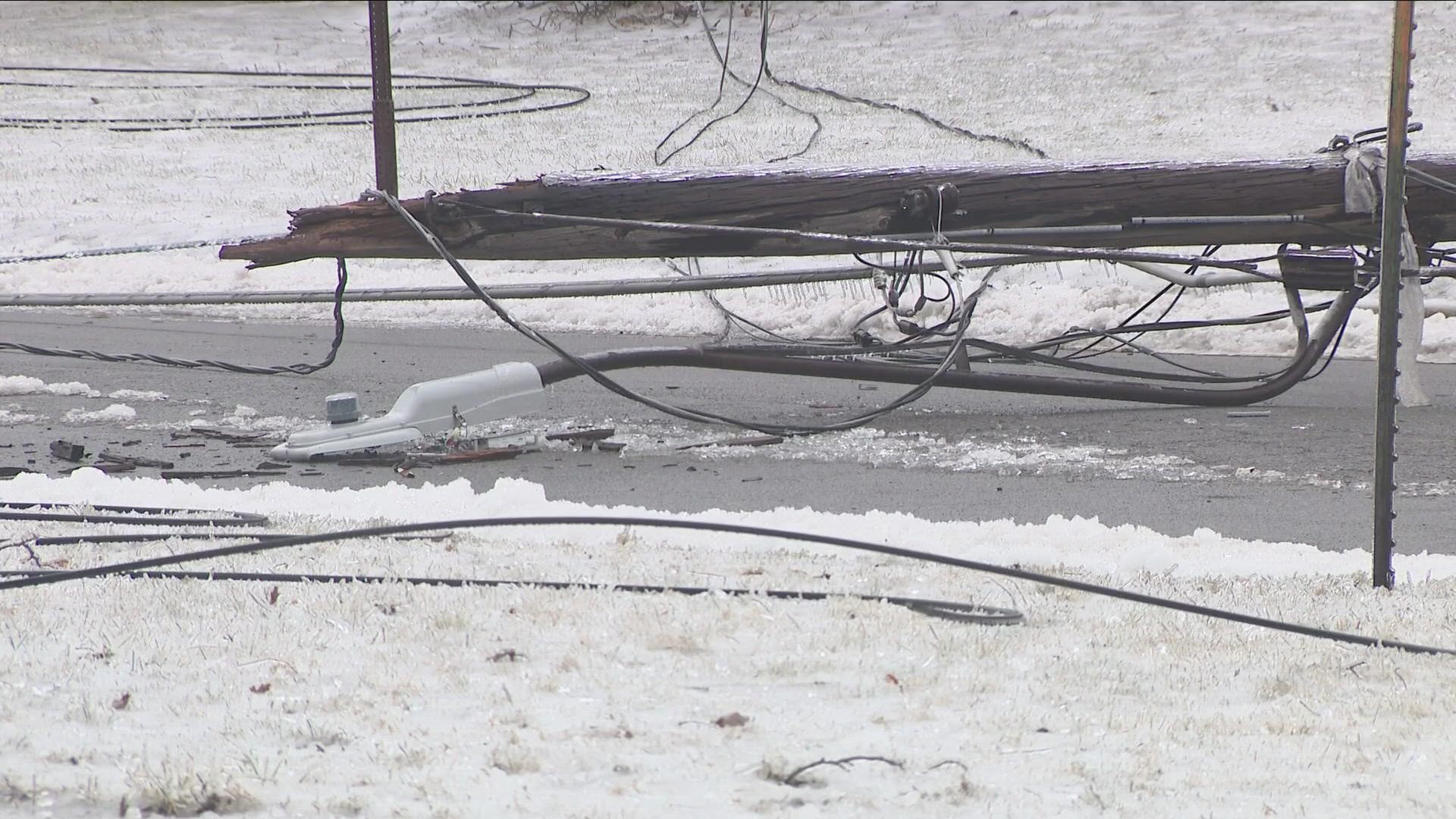 here on Center Road in West Seneca where even part of a utility pole seemingly snapped off taking down the power lines.