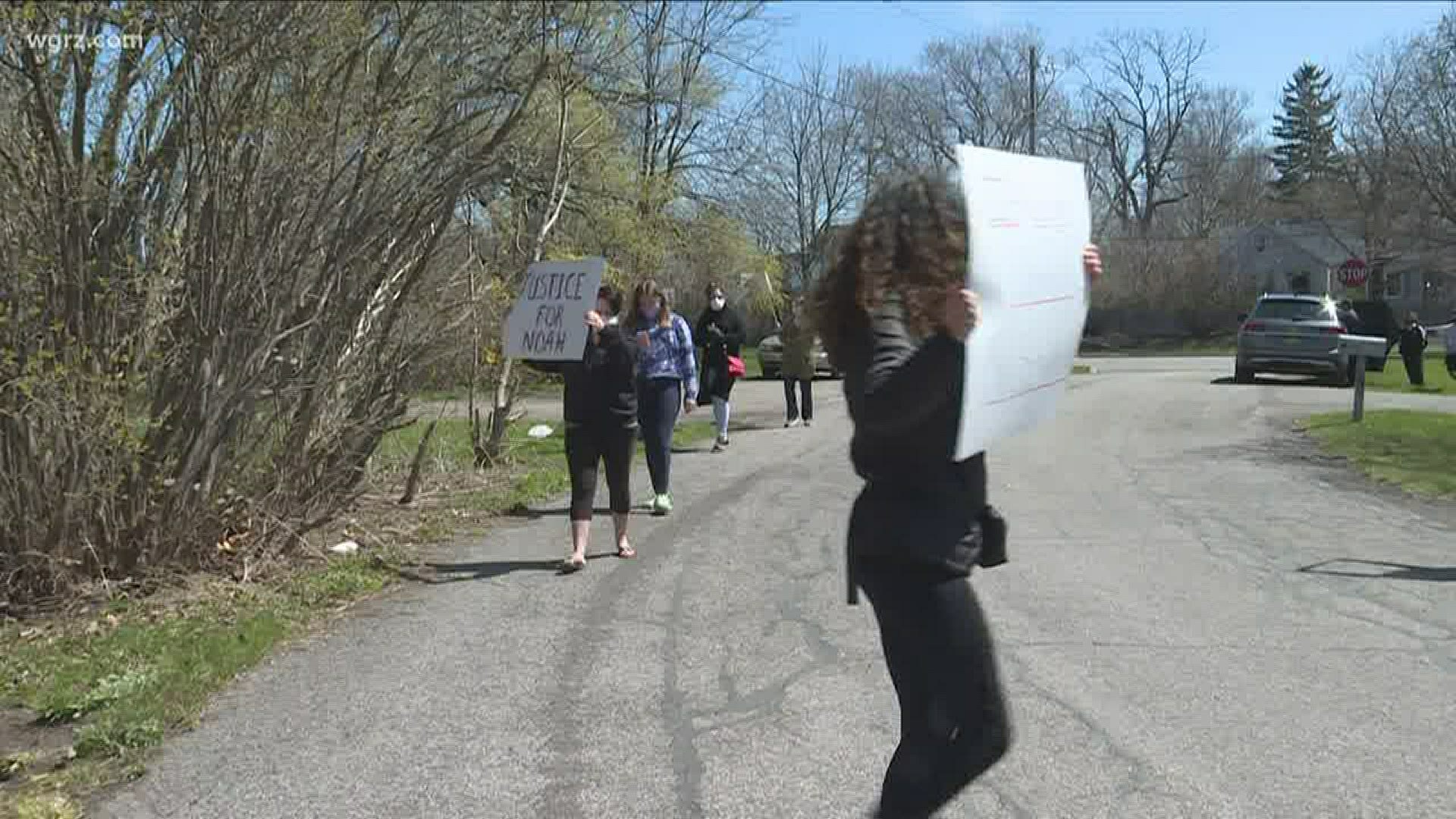 People rallied outside the home of a 5 year old boy on Lewiston Road a day after state police accused 48 year old Michael Wilson senior of assaulting him.
