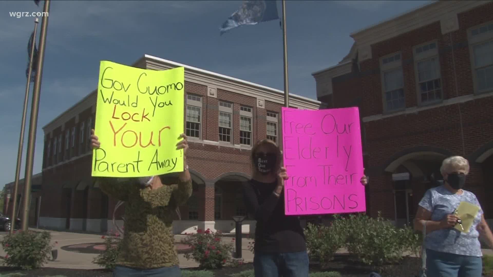 A protest in front of Batavia City Hall this morning.  Friends and family want visitation polices changed so they can see loved ones in nursing homes.