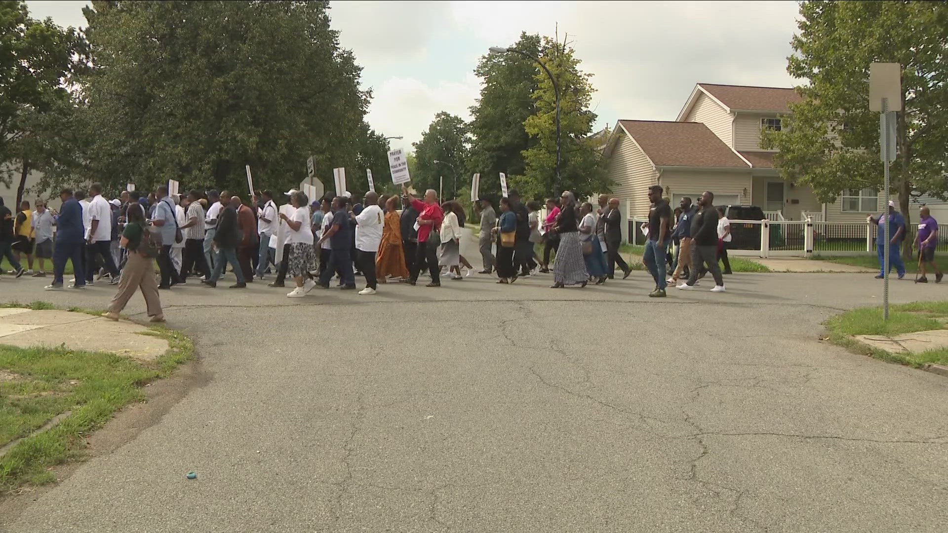 short march from a church to the Tops on Jefferson Avenue, it was the first time for families who lost victims on 5/14 to step foot on these grounds.">