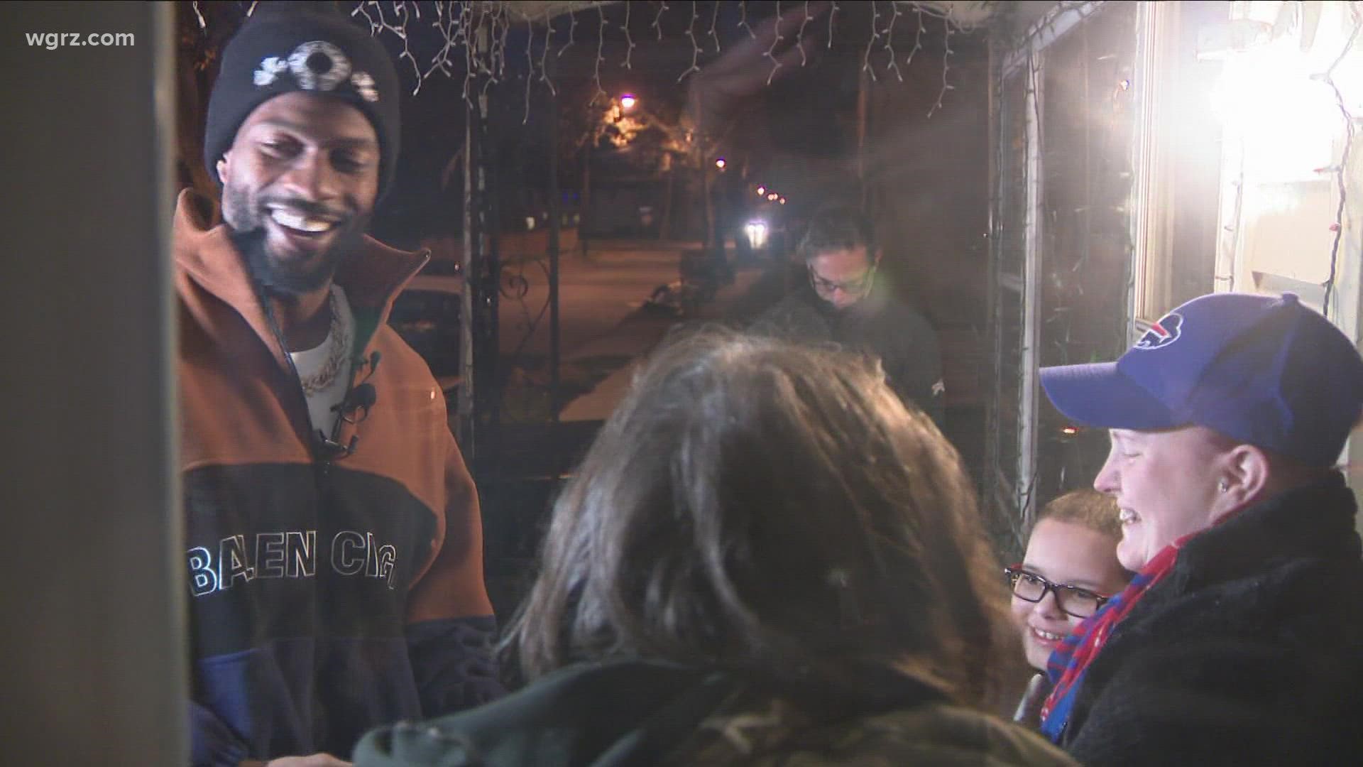 Bills wide receiver Emmanuel Sanders made several stops and surprised families during his "day of giving" Tuesday.