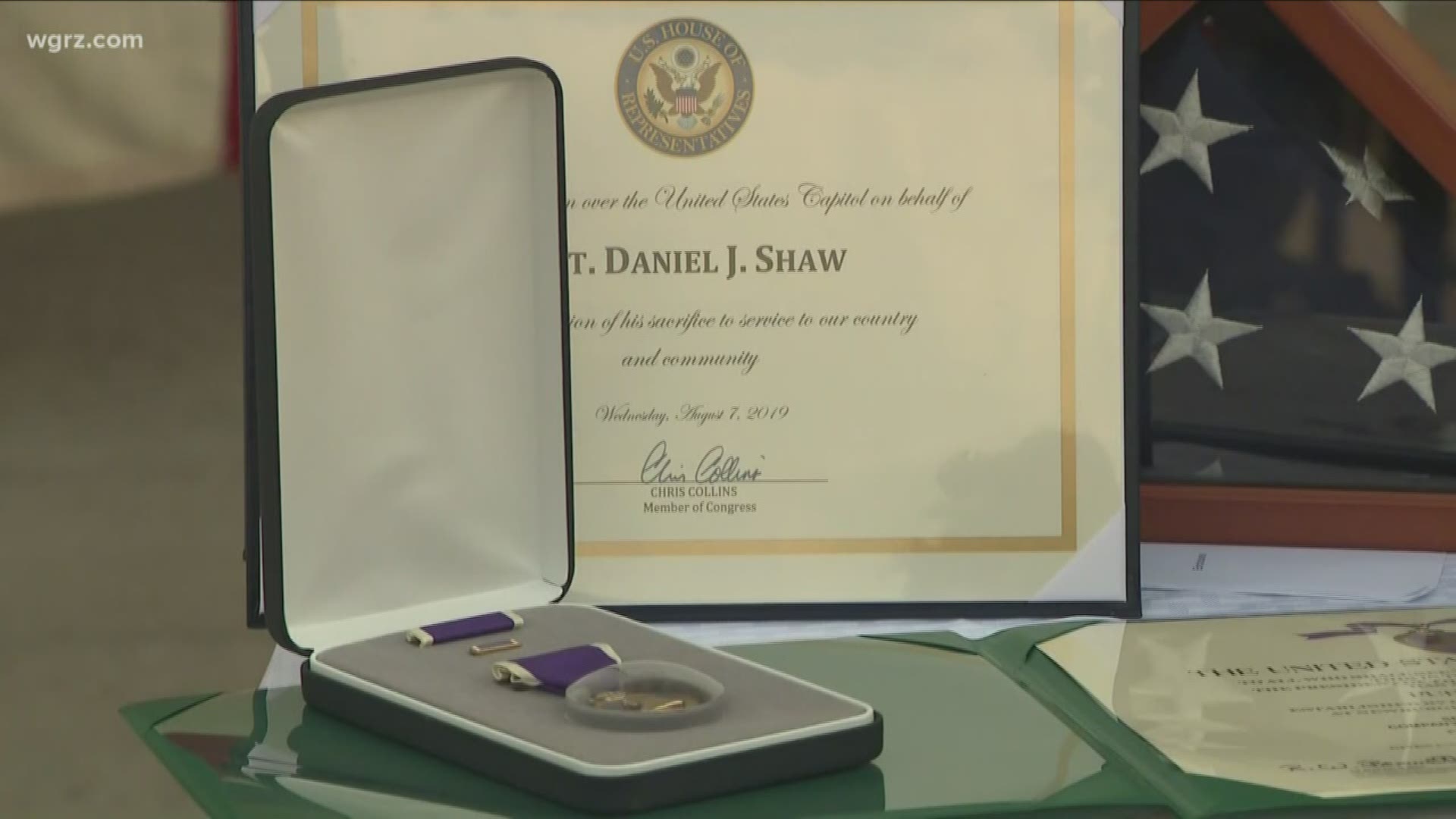 Chris Collins present at the family of the late Sergeant Daniel shower with a purple heart.