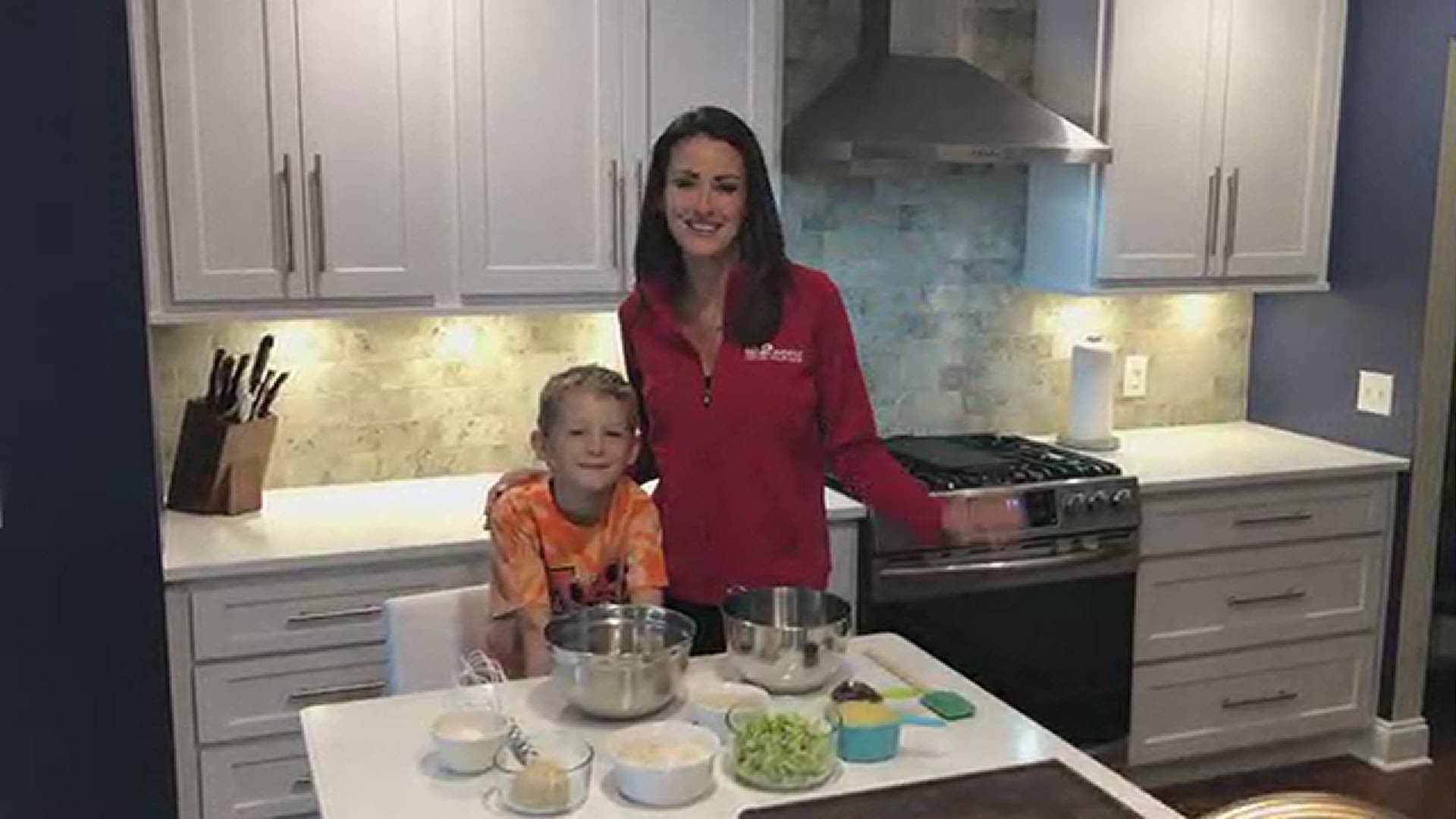 Daybreak's Melissa Holmes makes a healthy chocolate chip zucchini break with her son, Elliott. They made the video to promote Feedmore "Sweet Expectations."