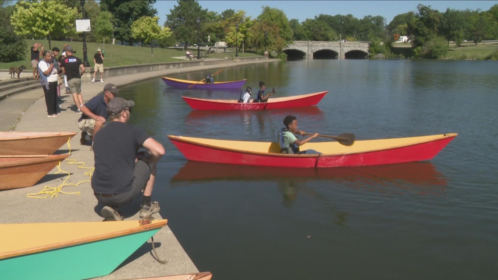 Canoes launched on Hoyt Lake built by kids