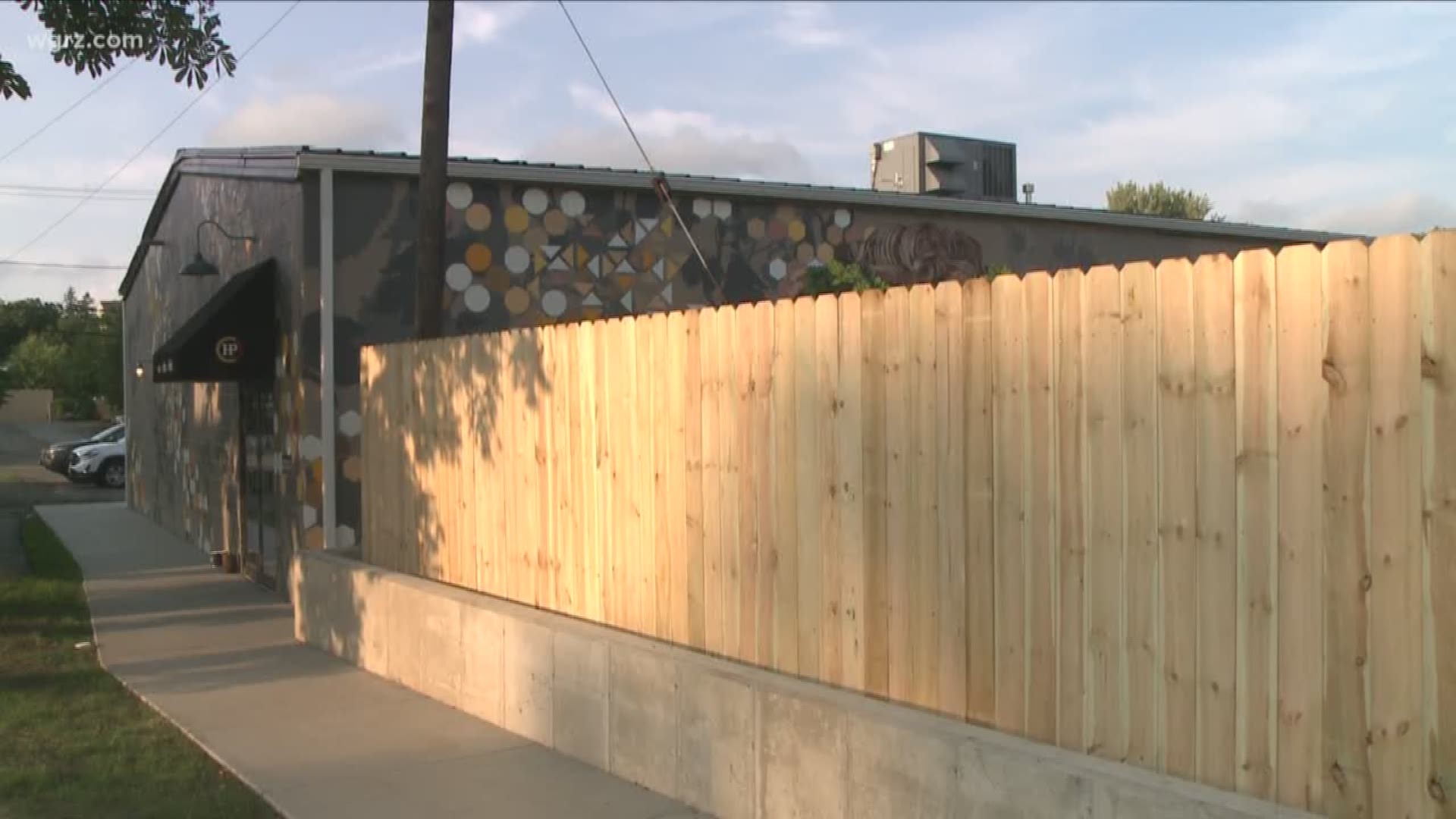 Fence goes up in front of Hamburg mural