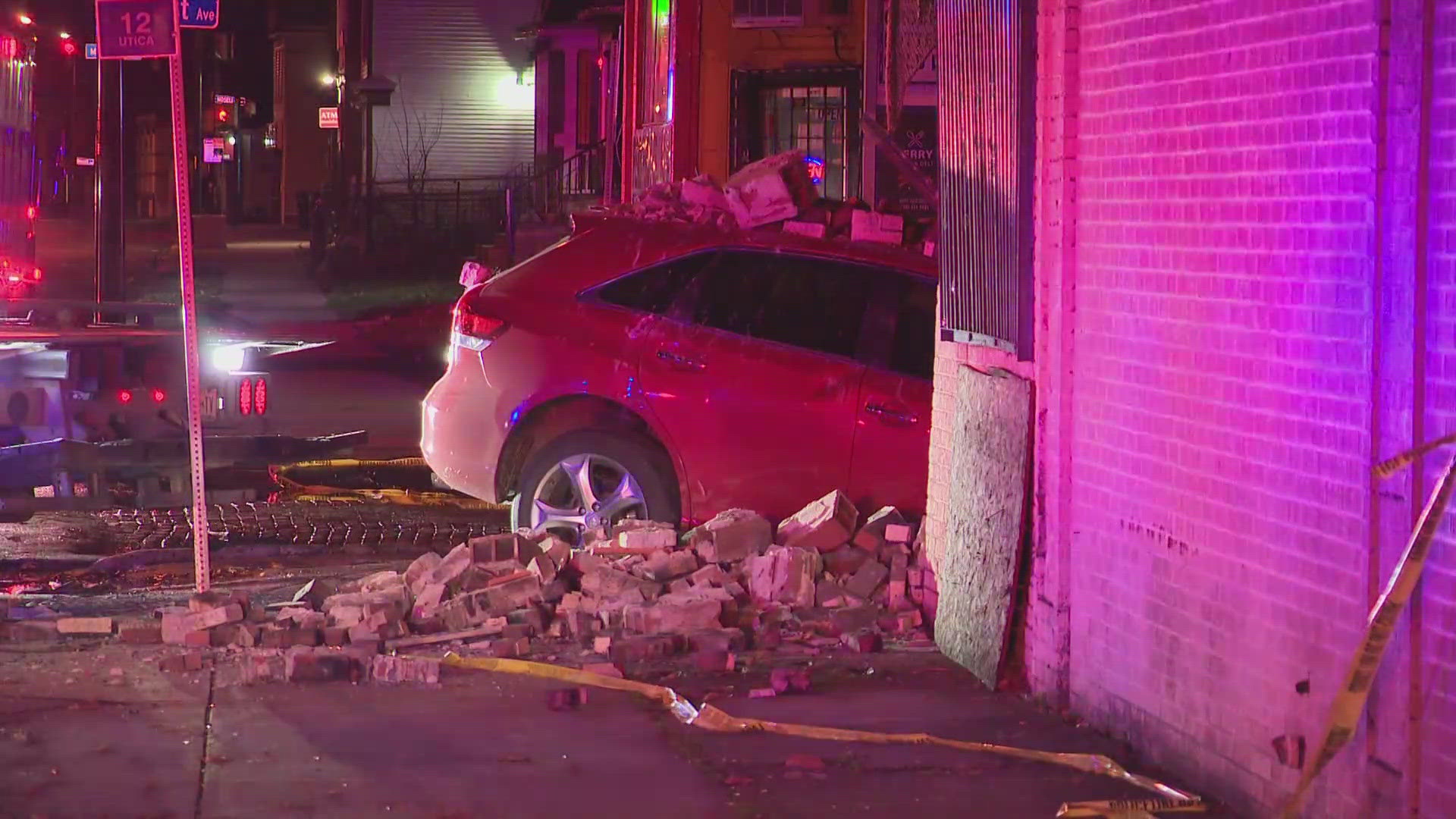 The car went through the boarded-up building's front door at the corner of Ernst Avenue and E. Ferry Street.