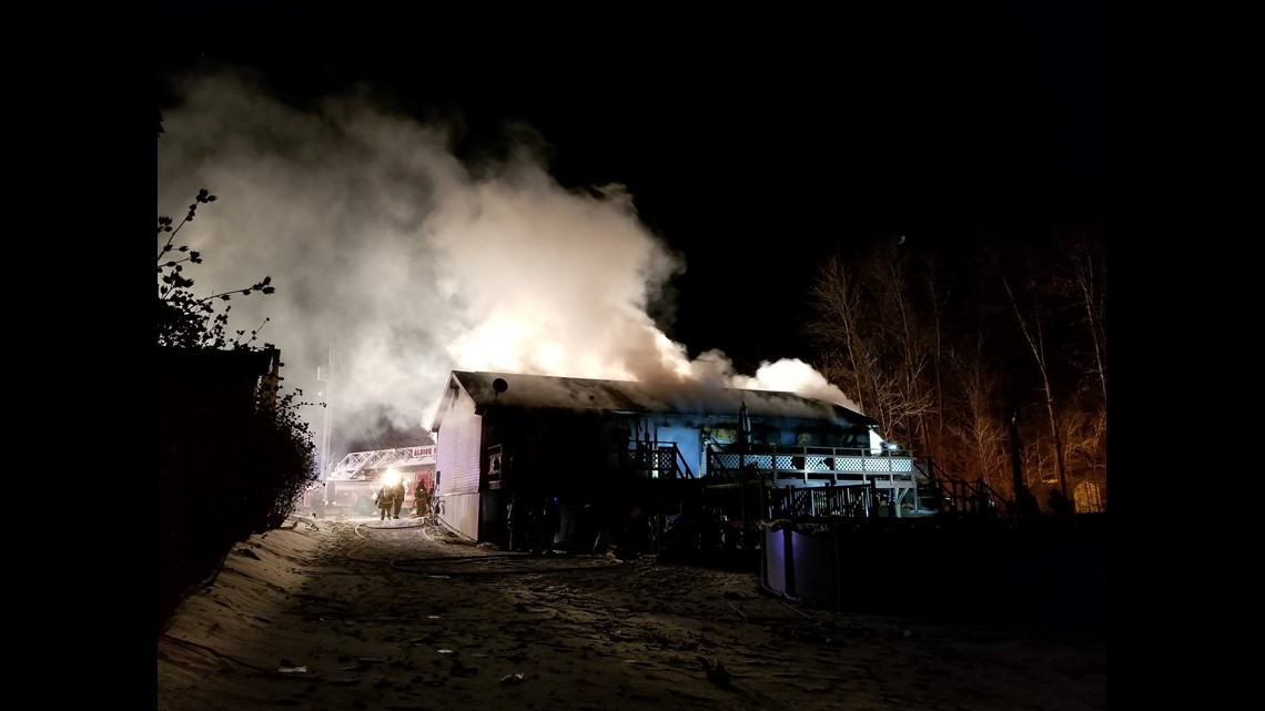 Two people taken to hospital with burn injuries after Albion house fire