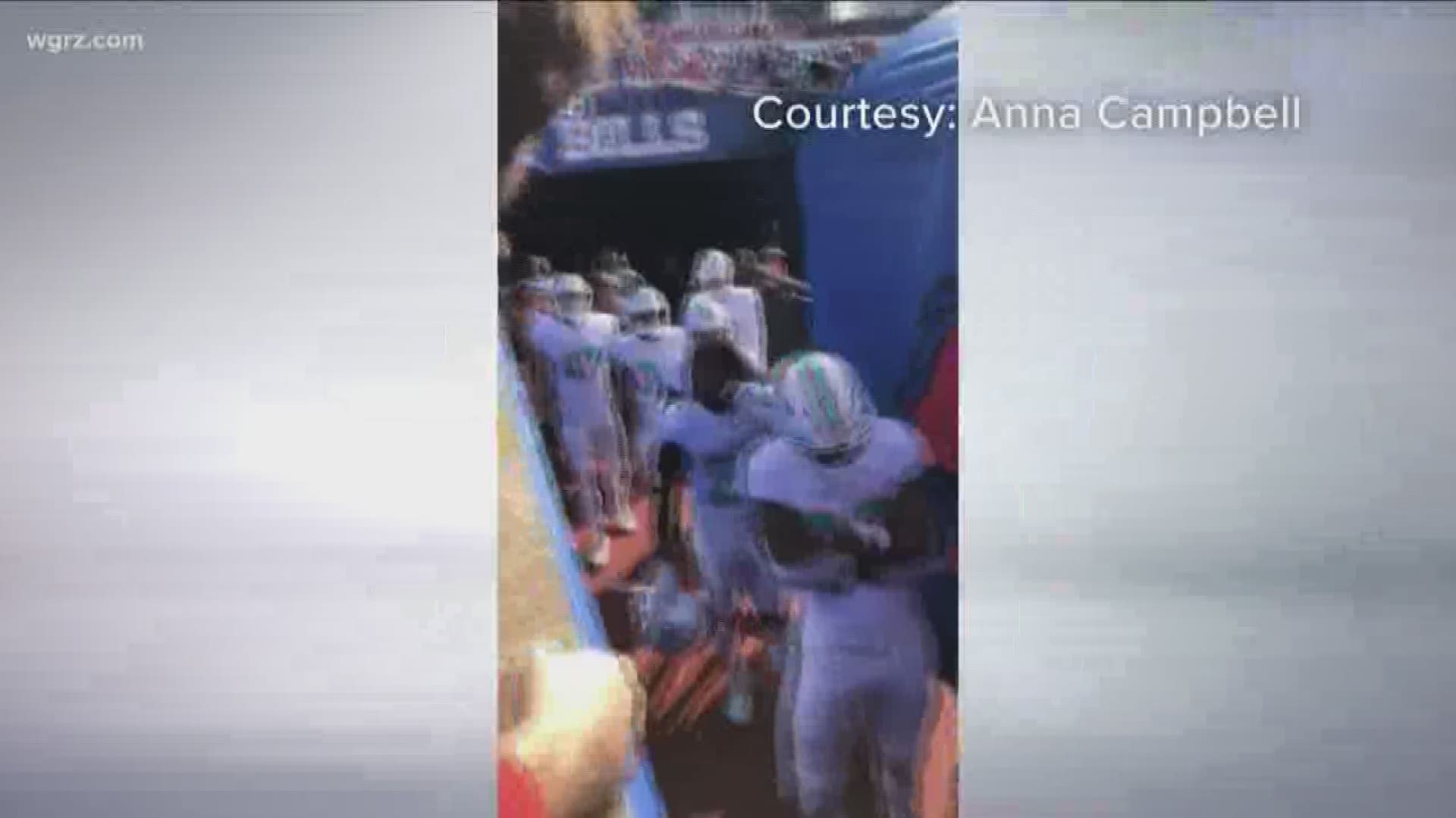 There was an altercation between a bills fan and a Miami dolphin player yesterday afternoon. The fan says the player spit on him and now there is an investigation.