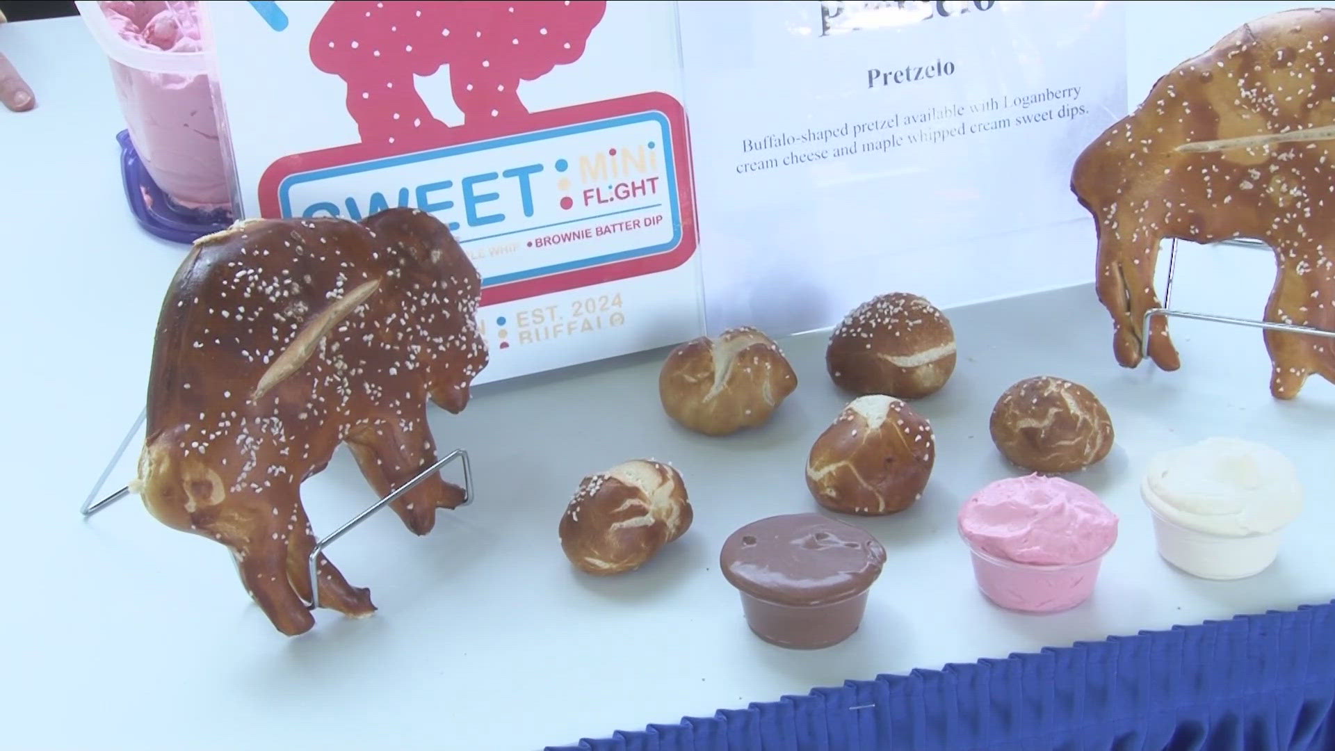 THE ERIE COUNTY FAIR IS KNOW FOR IT'S INNOVATIVE AND WACKY FOOD THIS YEAR IT A BUFFALO SHAPED PRETZEL CALLED PRETZELO