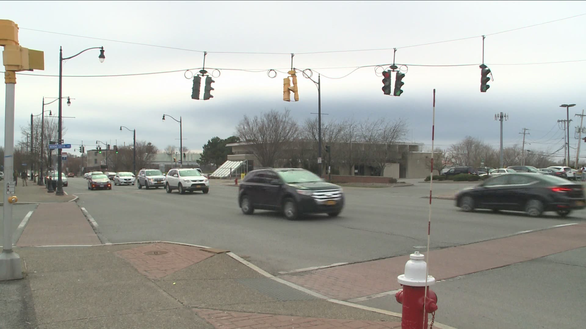 Police say a Dodge Charger was traveling north on Main Street when it hit the woman as she was crossing the street.