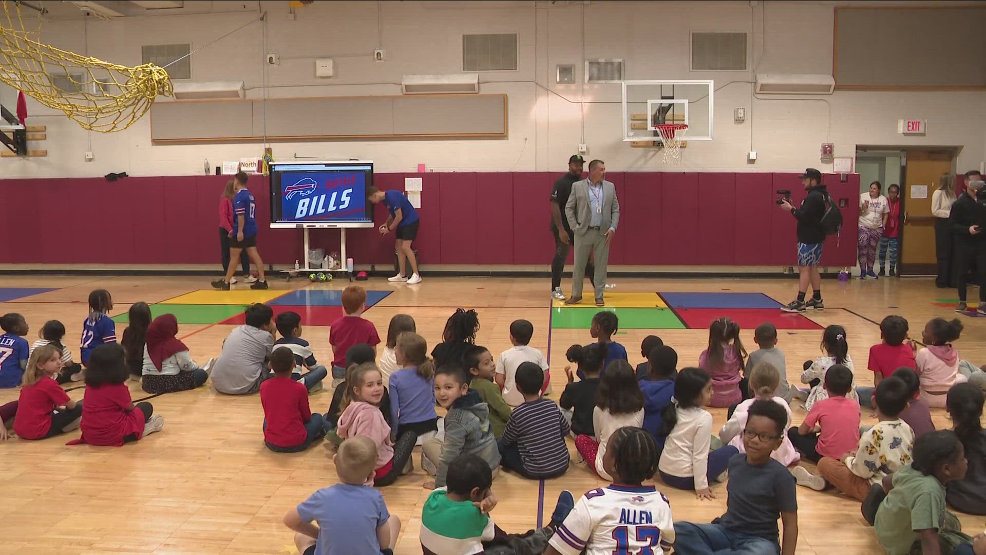 Dion Dawkins hands out boxes of cereal