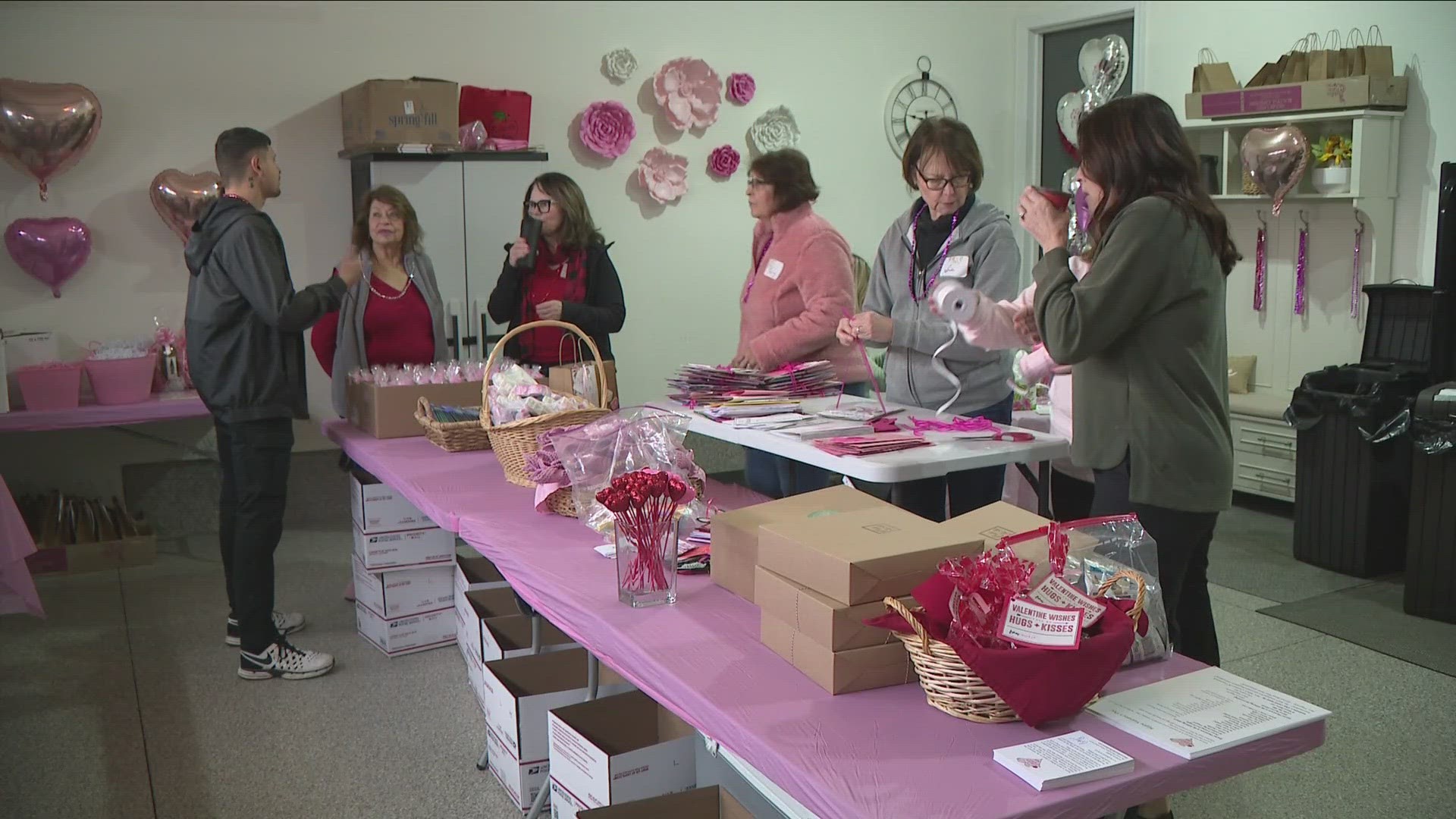 .. Catherine Szabad and the Hearts in Bloom volunteers spent hours yesterday making sure every card, gift, and flower was perfectly placed