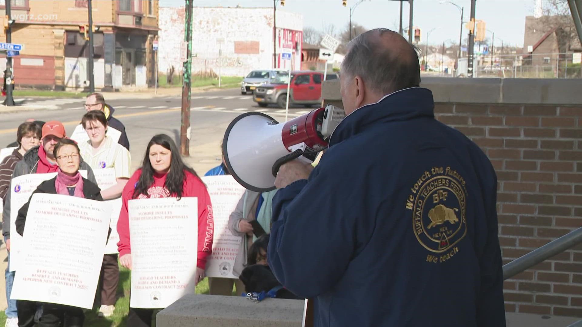 A group of teachers picketed outside the school board meeting Wednesday evening.