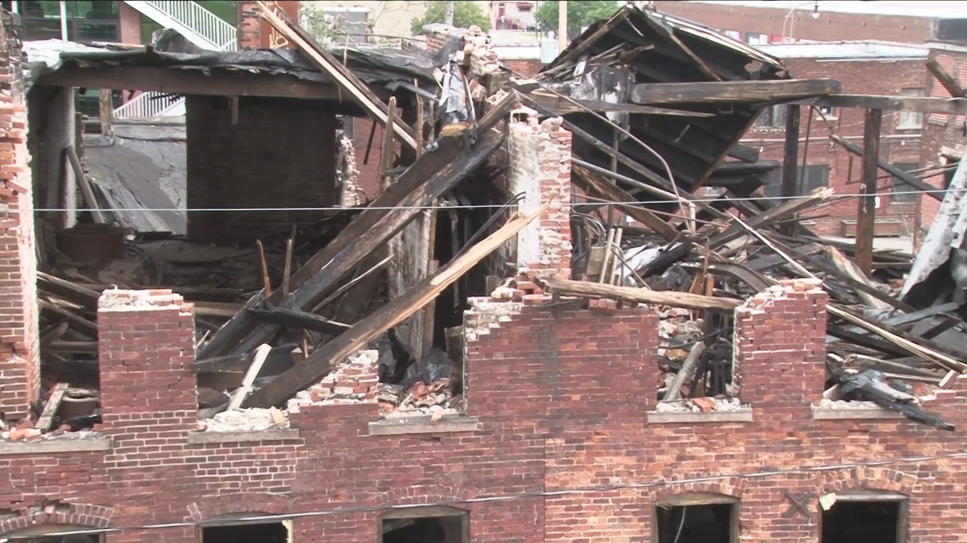 Are the 2 Cobblestone District buildings damaged in a massive June fire "wood framed" or "timber"? That seems the be the argument between Darryl Carr and the city.