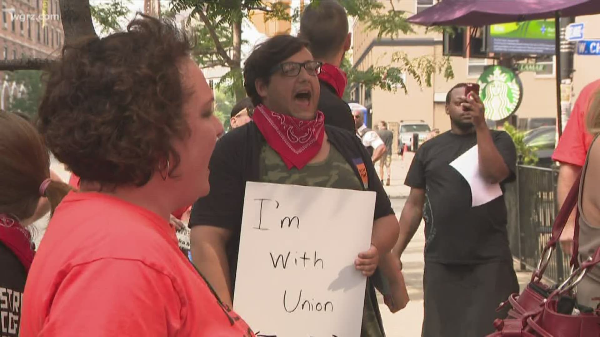 A group was protesting outside the spot coffee shop on Delaware and Chippewa this afternoon.