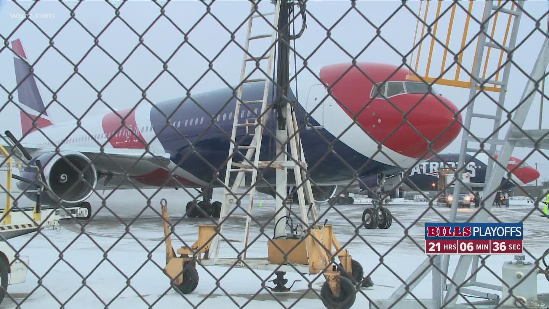 The ten Patriots fans that live in Western New York greeted the teams two planes, yes the Patriots fly with two aircraft.