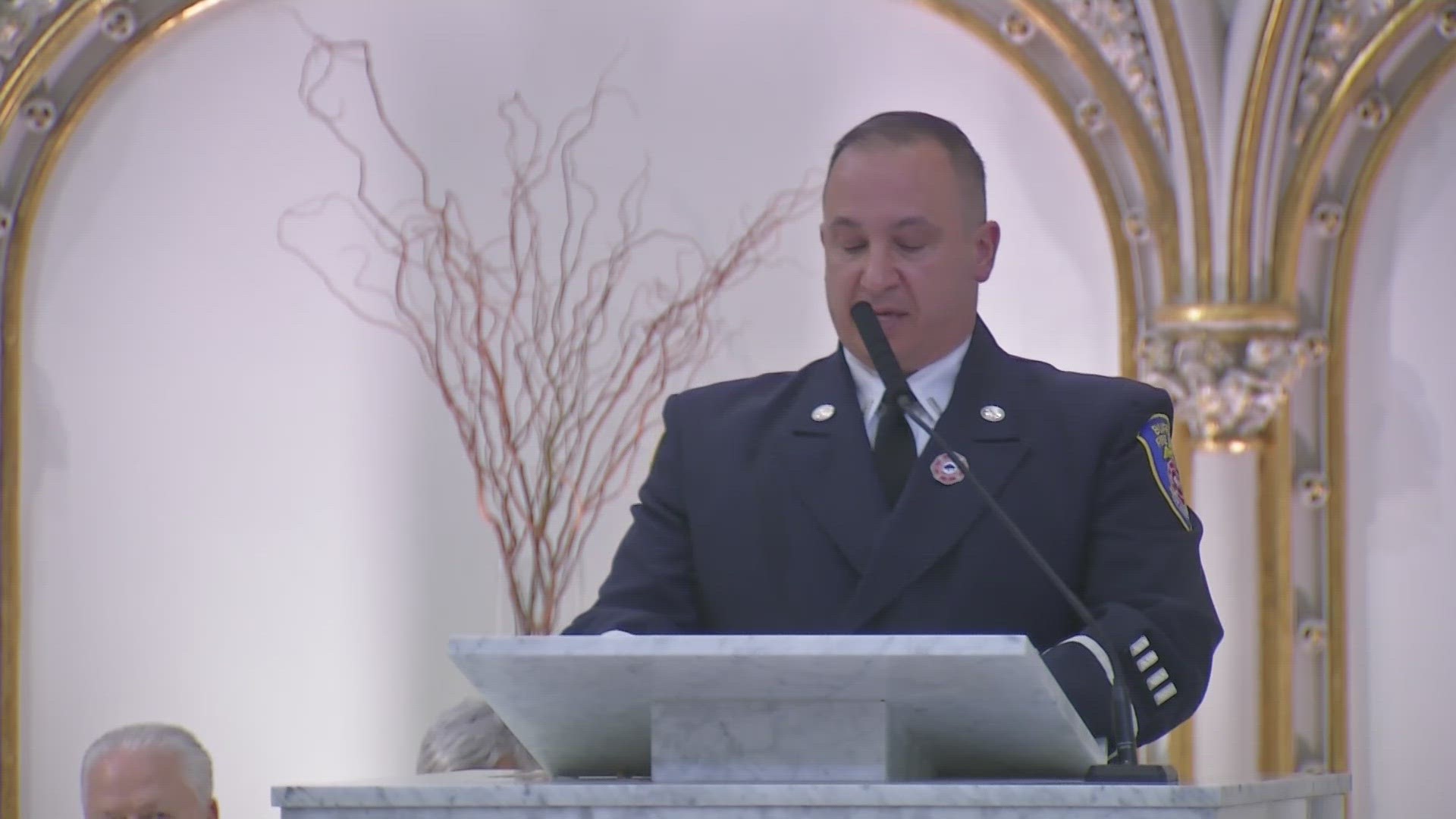 Vinny Ventresca, President of Local 282 Buffalo Firefighter's Union, speaks at fallen Buffalo Firefighter Jason Arno's funeral
