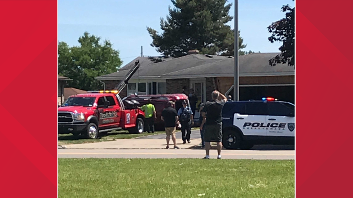 Woman injured after car hits house in Cheektowaga