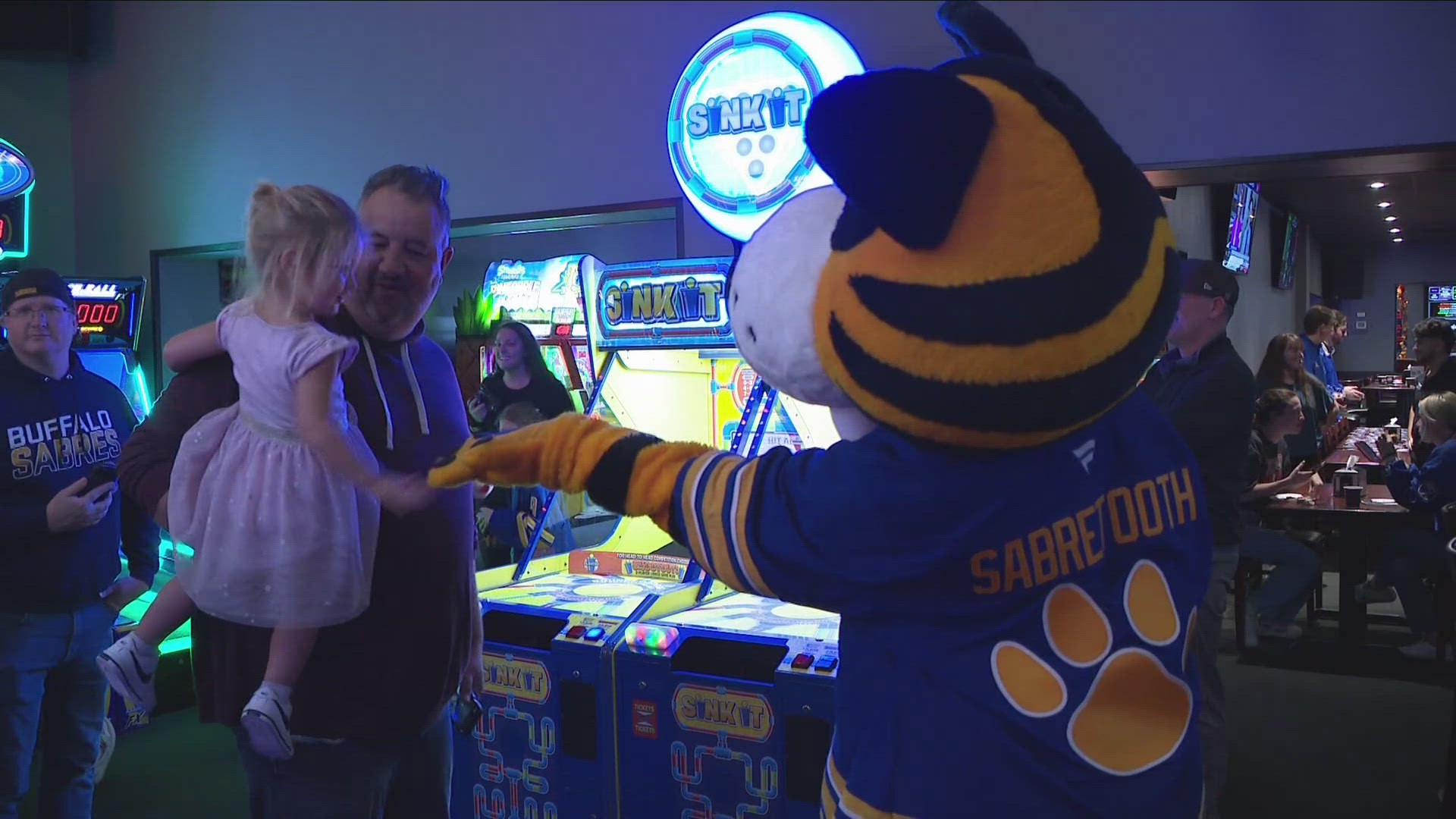 The Buffalo Sabres can play more than just hockey.  On Monday night, a few players traded in their hockey sticks for laser tag guns.