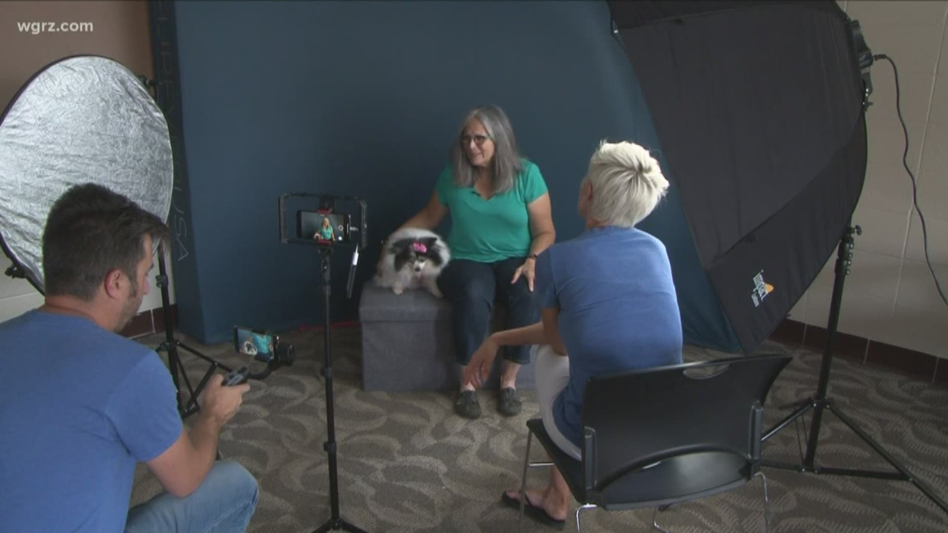 The organization called "Furever USA" made a stop in Western New York today to document how a few local rescue dogs have helped transform their families.