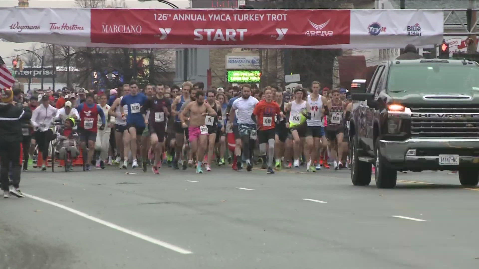 About 14 thousand participants flood the streets for the annual Thanksgiving Day event.