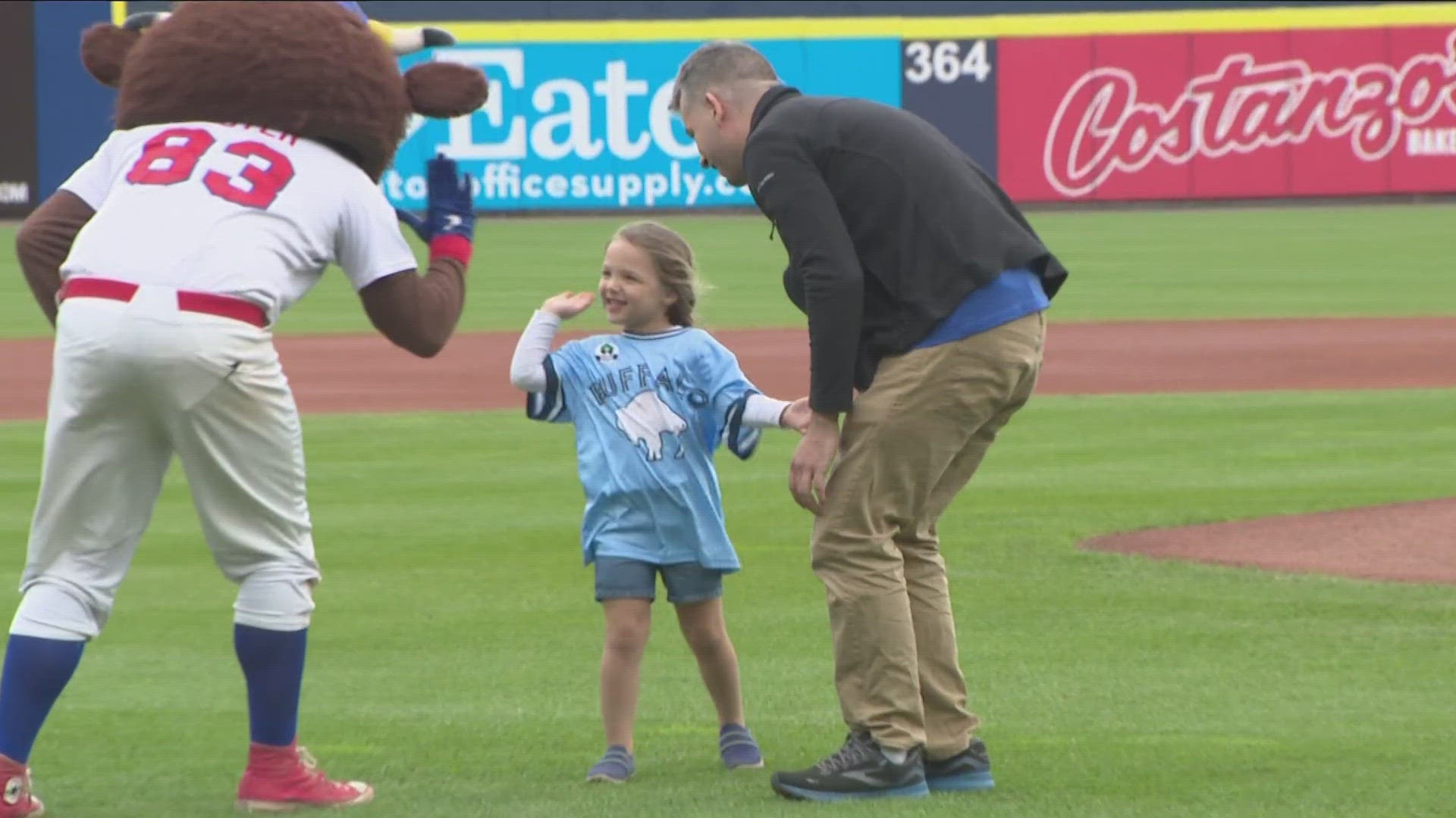 Four-year-old Olivia Arno threw out the first pitch at the Bison's game Saturday.