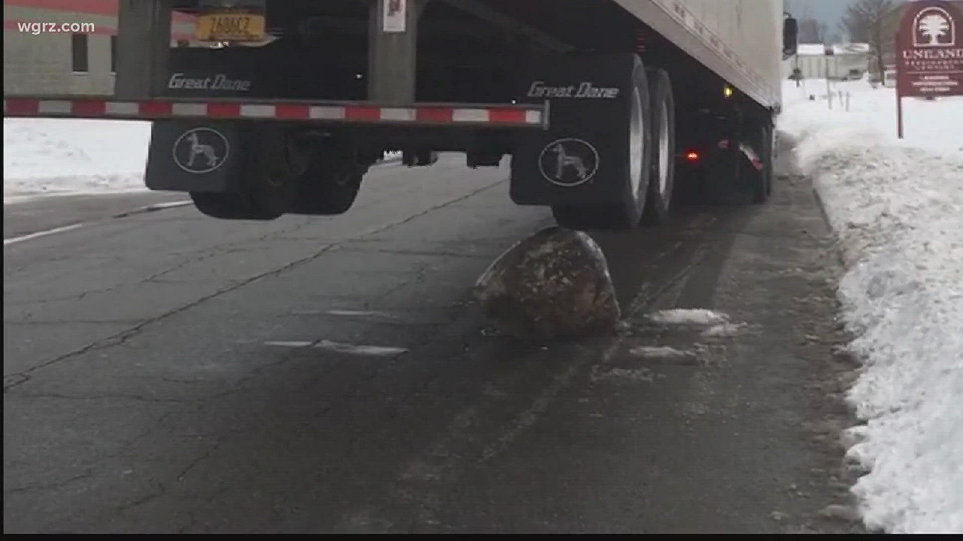 Tractor trailer drags boulders more than a mile