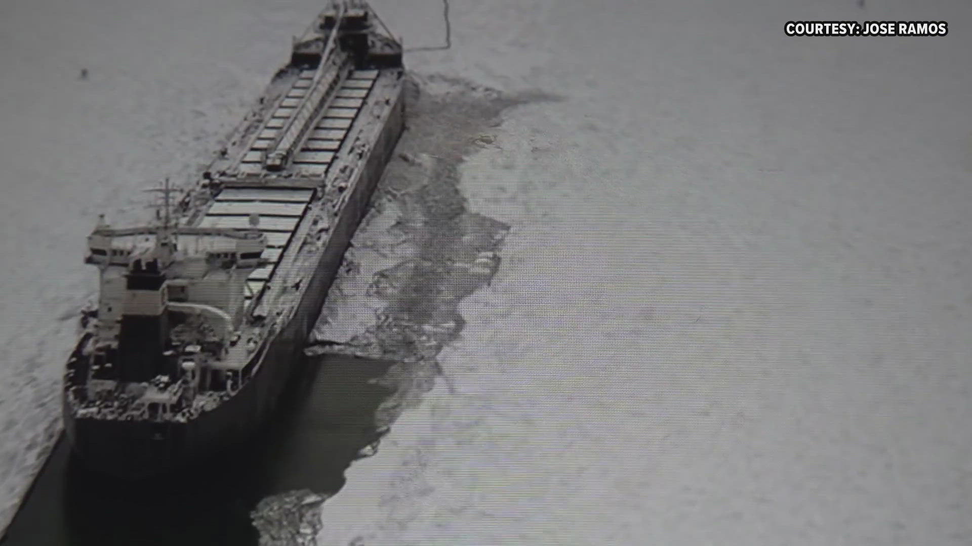 An ice-cutting barge made its way to a vessel that was stuck in the ice on Lake Erie near Buffalo. 