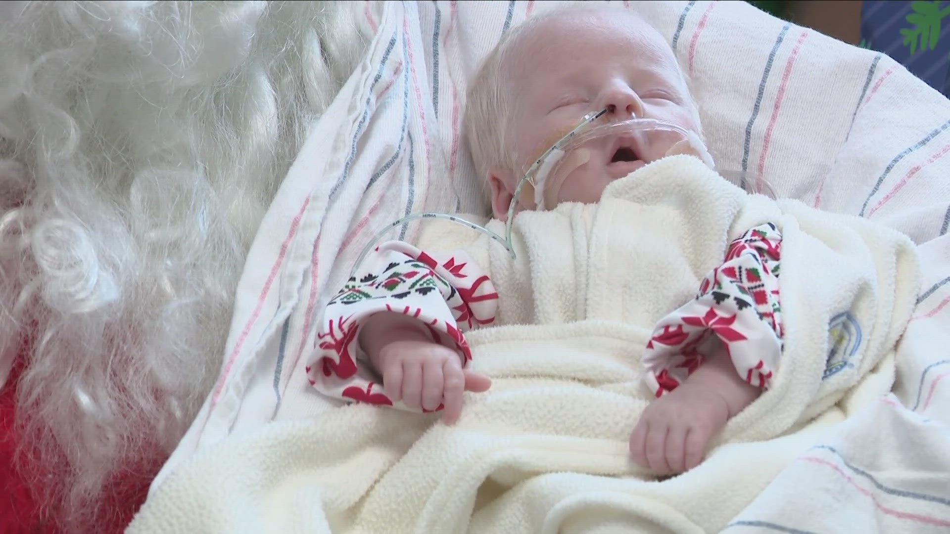 See photos of Santa visiting with tiny babies in a NICU