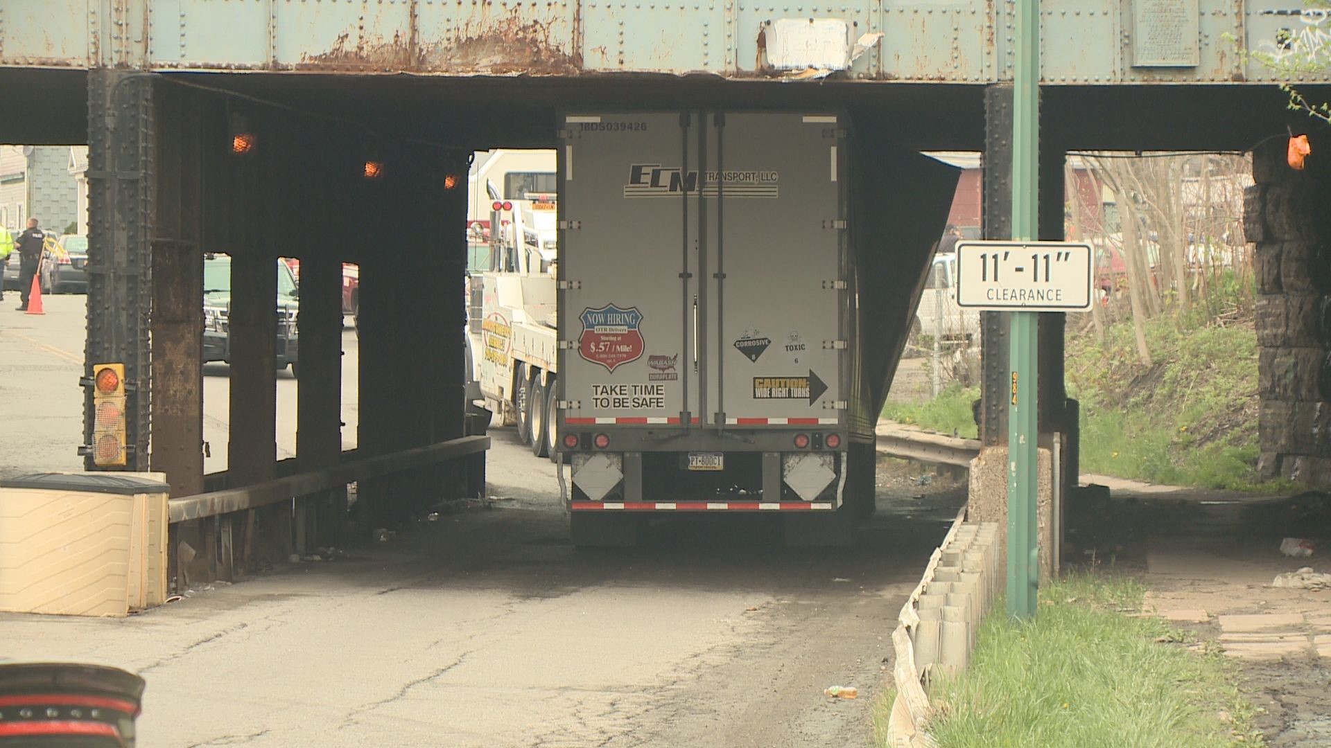 PHOTOS: Tractor Trailer gets stuck under Clinton Street bridge | wgrz.com